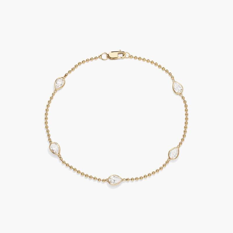 East-West Bezel Beaded Station Bracelet With 1 CTW Pear Shaped Lab-Grown Diamonds in 14K Yellow Gold