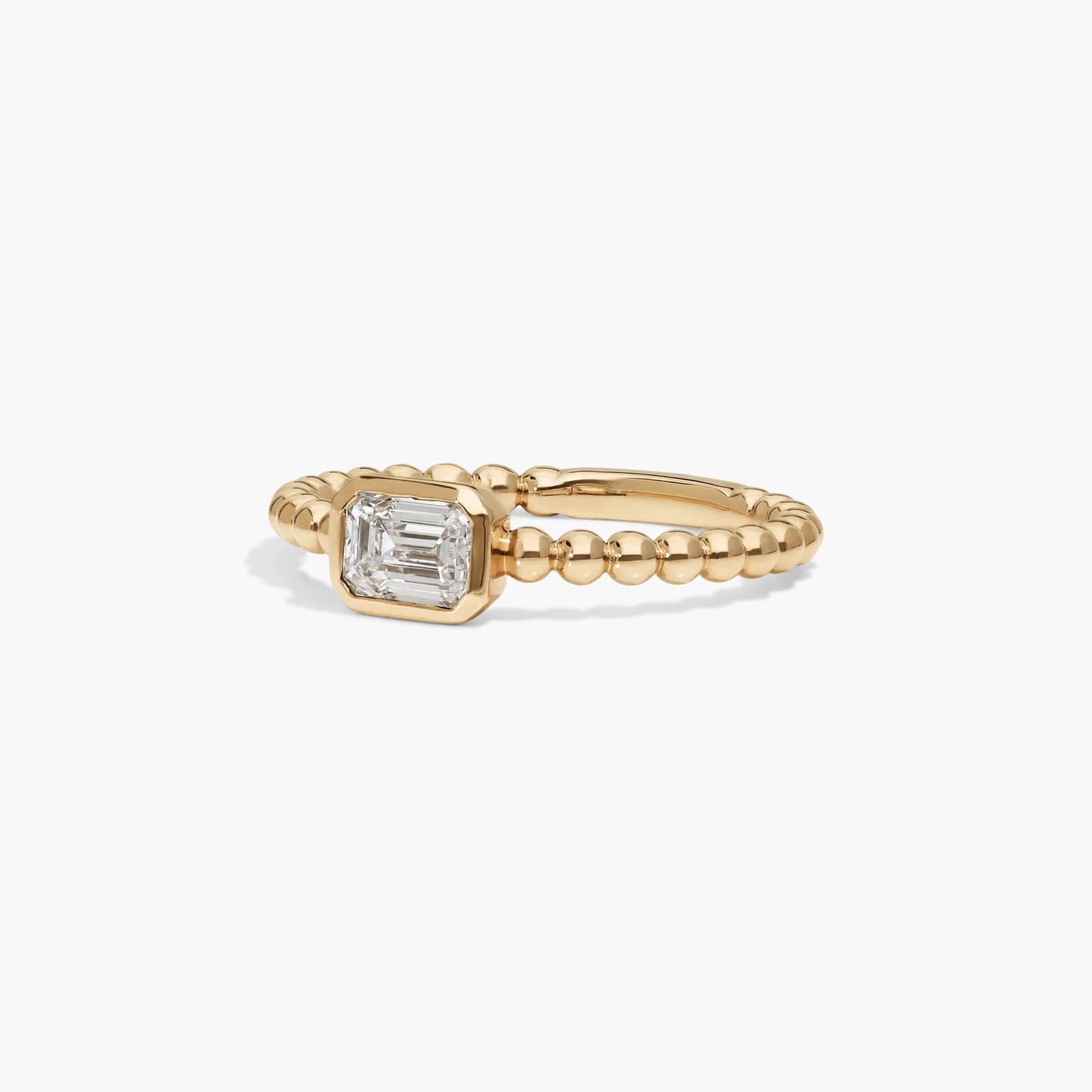 East-West Bezel Beaded Ring With 0.5 CTW Emerald Cut Lab-Grown Diamond in 14K Yellow Gold