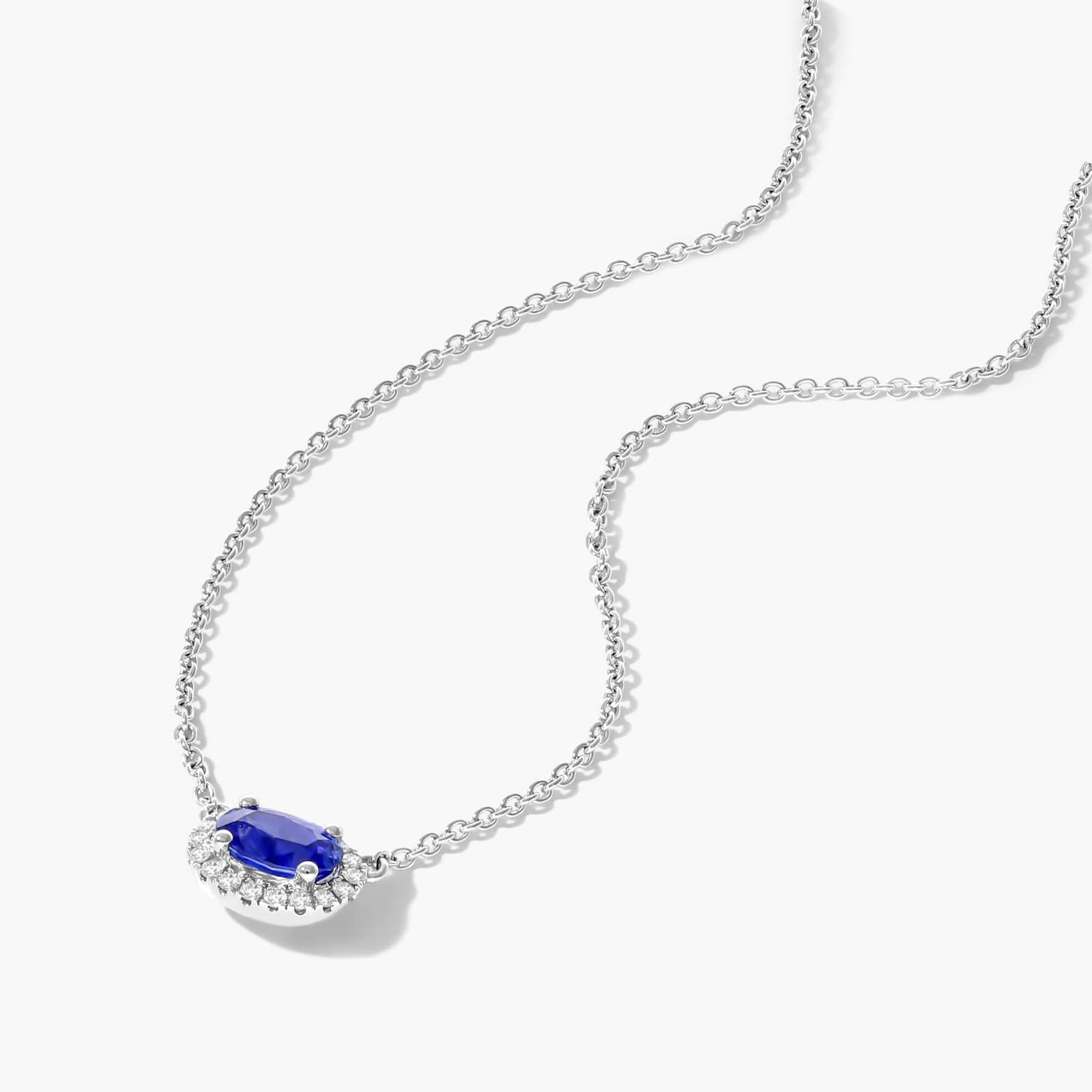 18K White Gold East West Set Oval Halo Sapphire and Diamond Necklace (6.0x4.0mm)