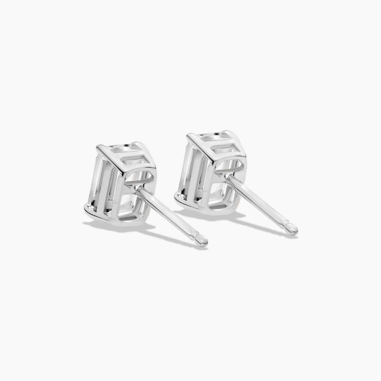 Emerald Cut White Topaz Birthstone Stud Earrings In 14K White Gold
