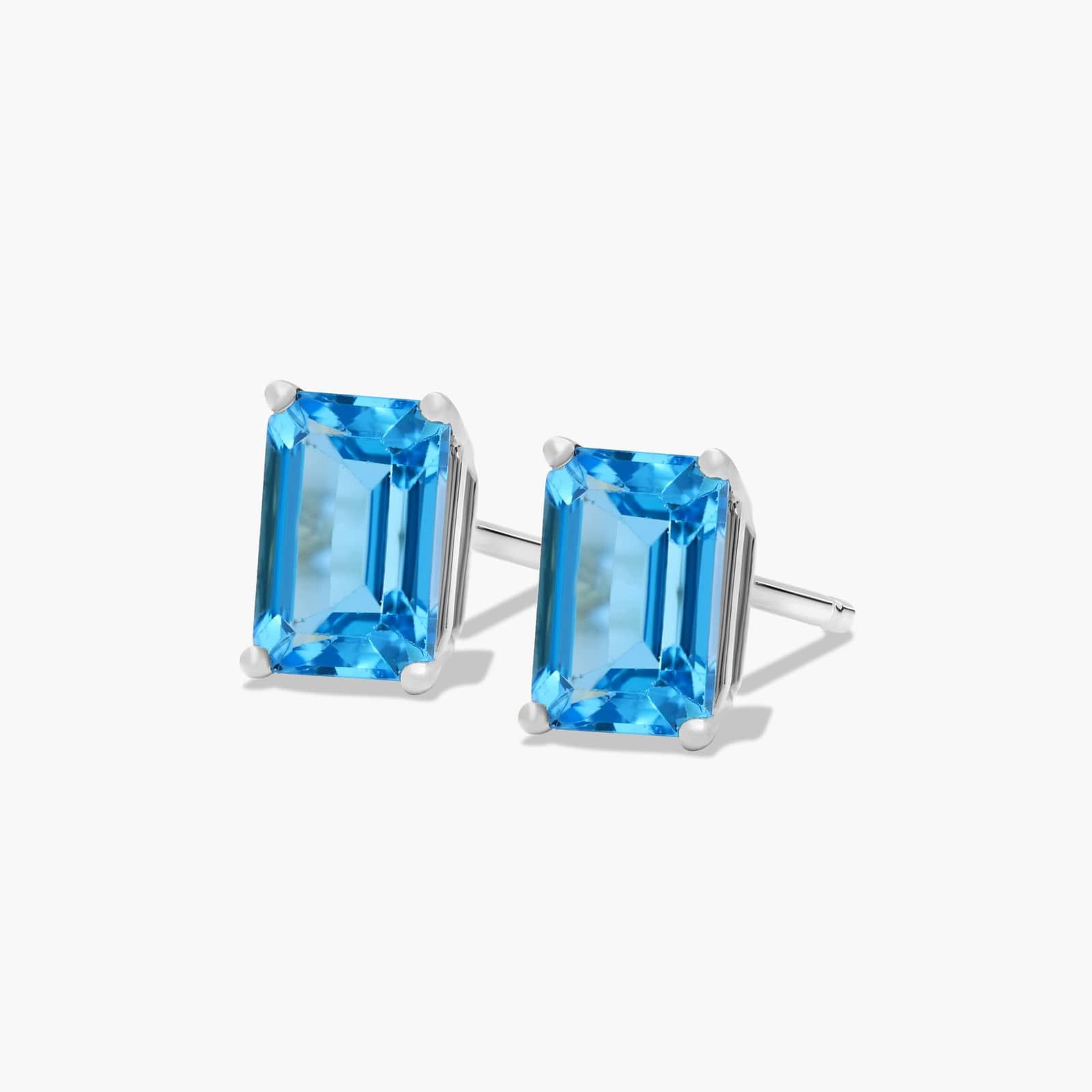 Emerald Cut Swiss Blue Topaz Birthstone Stud Earrings In 14K White Gold