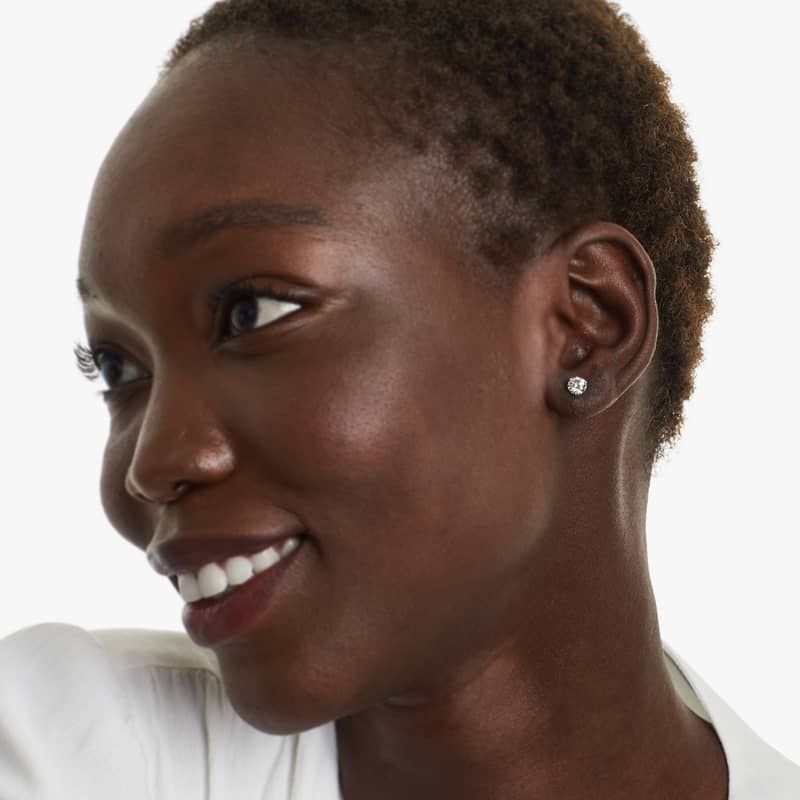 Platinum Three Prong Martini Round Brilliant Diamond Stud Earrings (1.00 CTW - F-G / VS1-VS2)