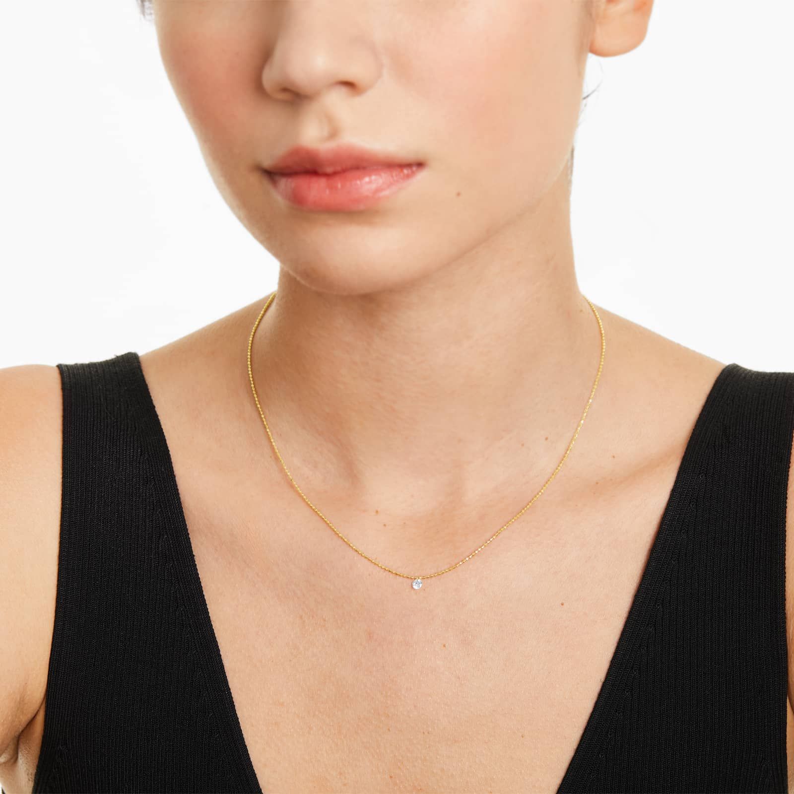 Single Pierced Diamond Speck Necklace In 14K Yellow Gold by Brevani