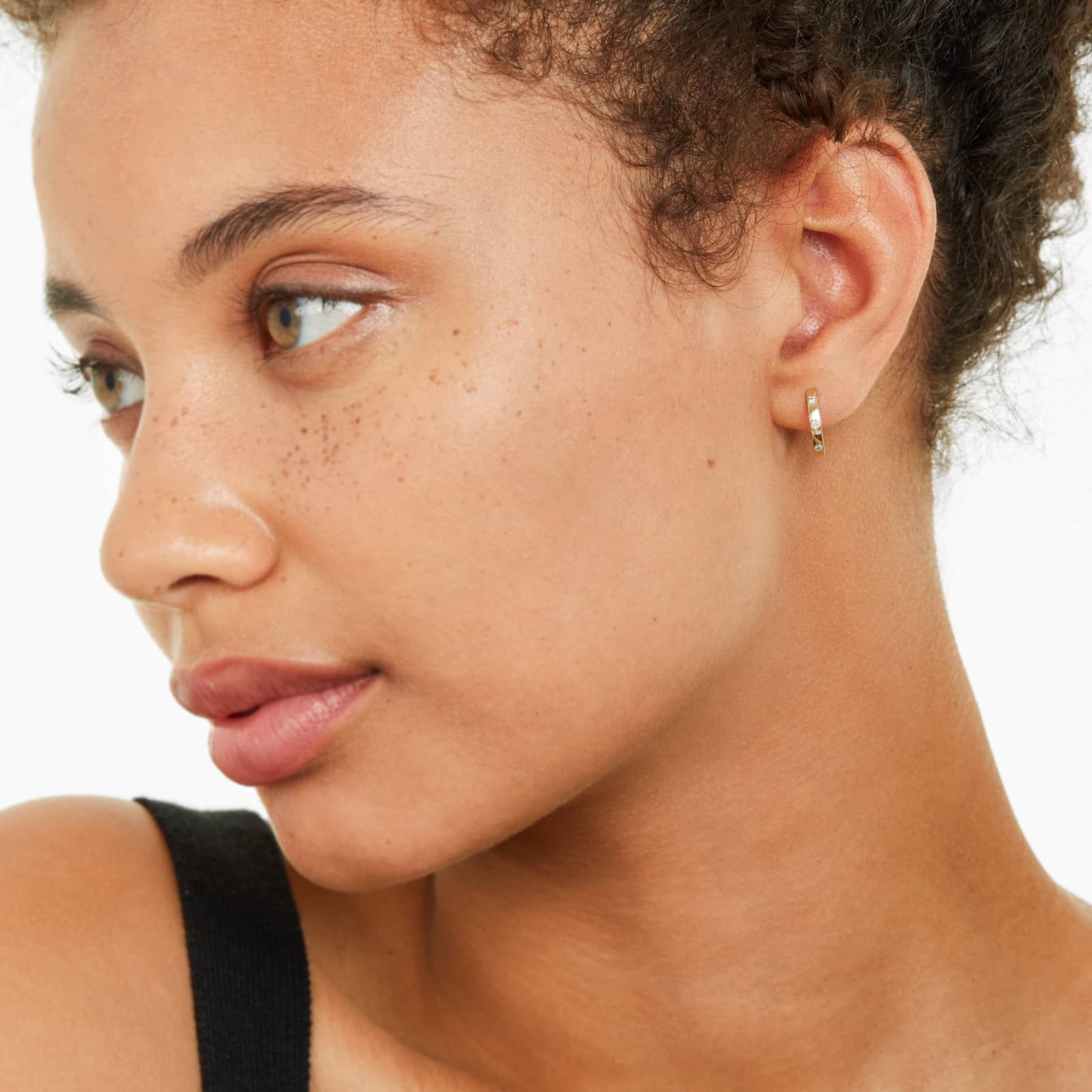 Bezel Diamond Huggie Hoop Earrings In 14K Yellow Gold