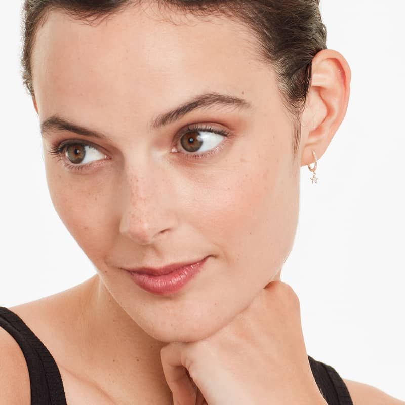 Dangling Star And Moon Diamond Huggie Hoop Earrings In 14K Rose Gold