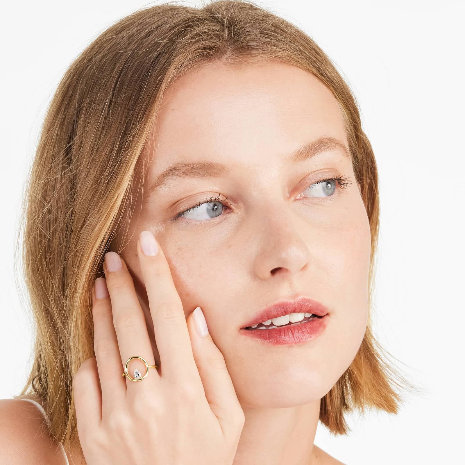 Orbit Pear Shape Diamond Ring In 14K Yellow Gold