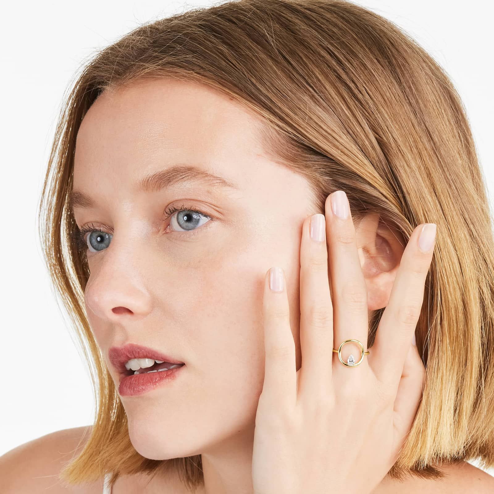 Orbit Pear Shape Diamond Ring In 14K Yellow Gold