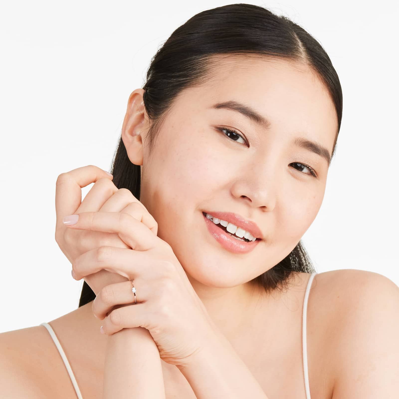 Petite Oval Cut Solitaire Diamond Ring In 14K Rose Gold