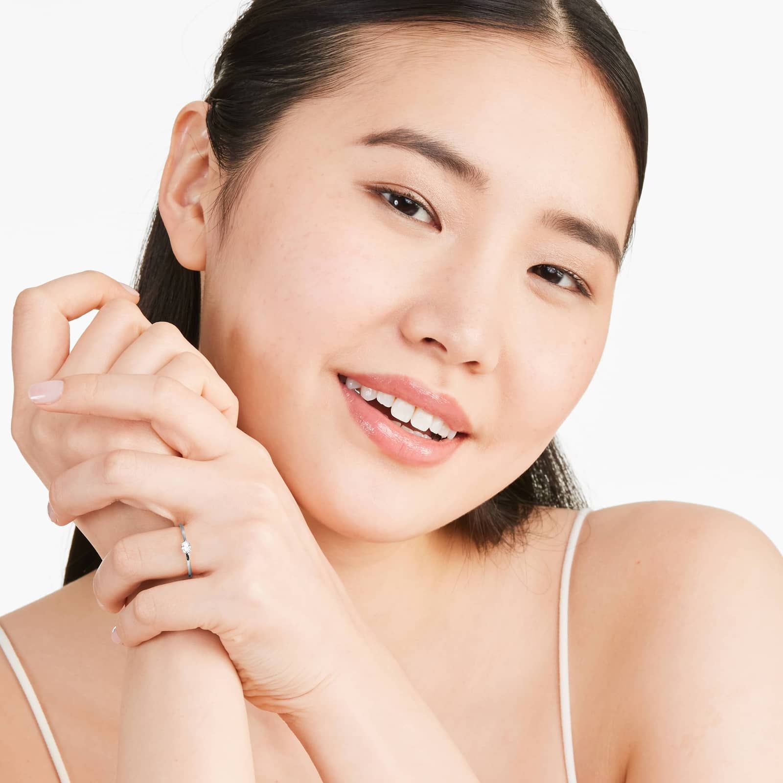 Petite Oval Cut Solitaire Diamond Ring In 14K White Gold