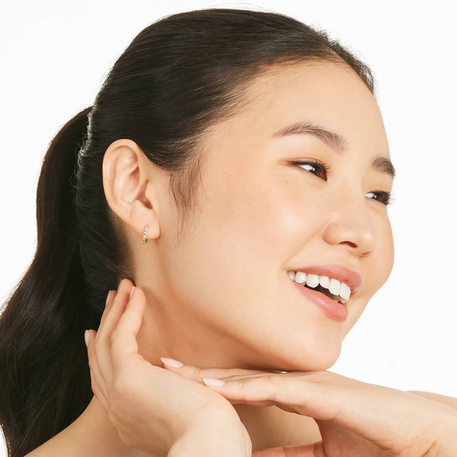 Diamond Huggie Hoop Earrings In 14K Yellow Gold