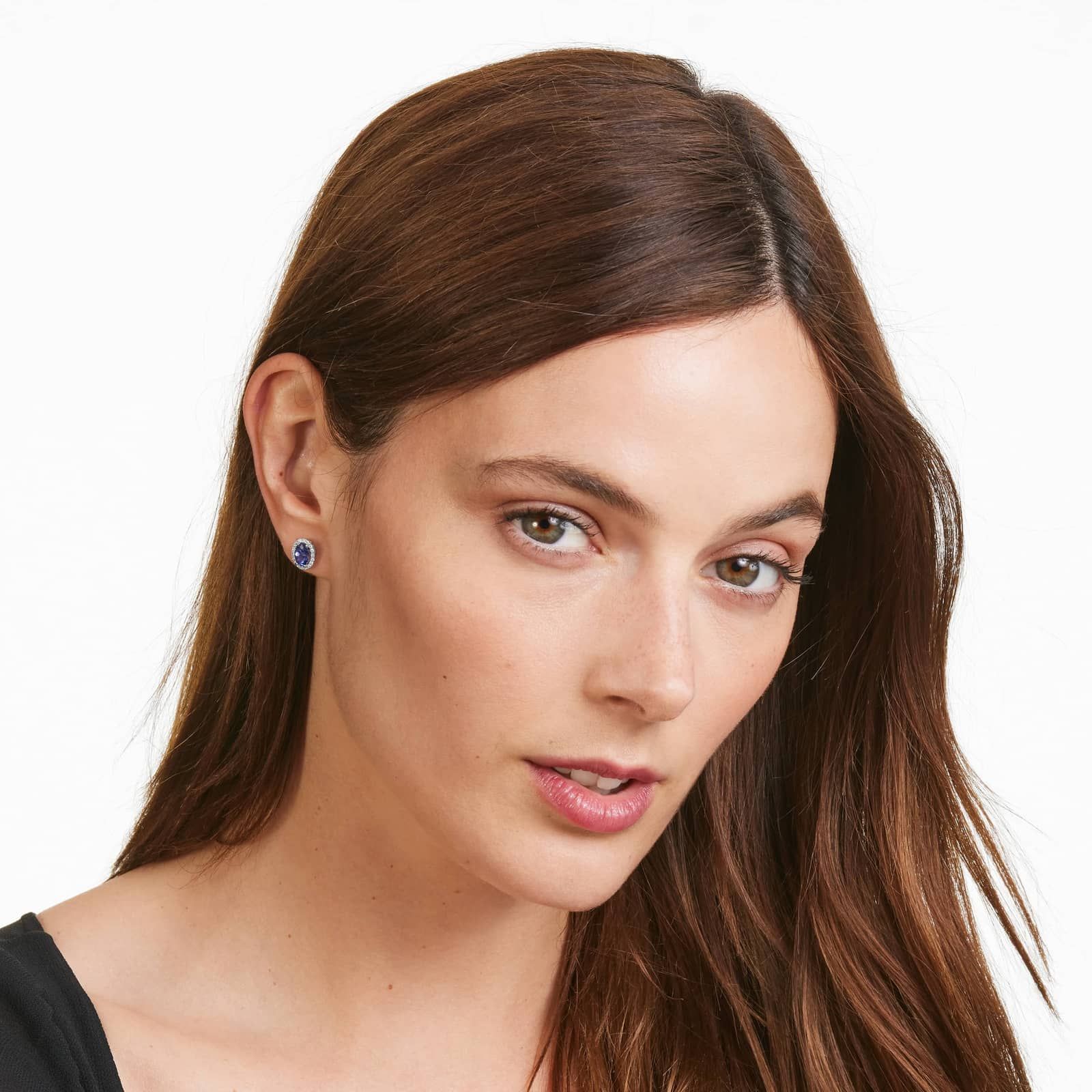 Oval Cut Tanzanite And Diamond Halo Stud Earrings In 14K White Gold