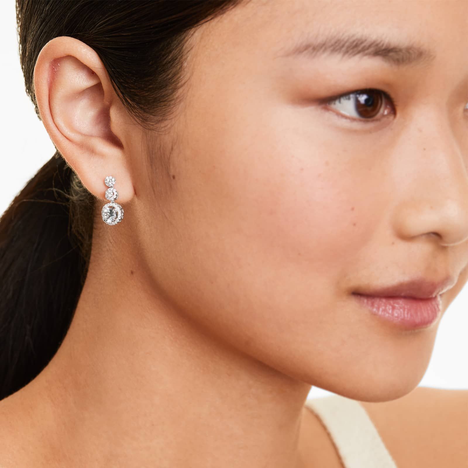 Graduated Round Aquamarine Trio And Diamond Halo Drop Earrings In 14K White Gold