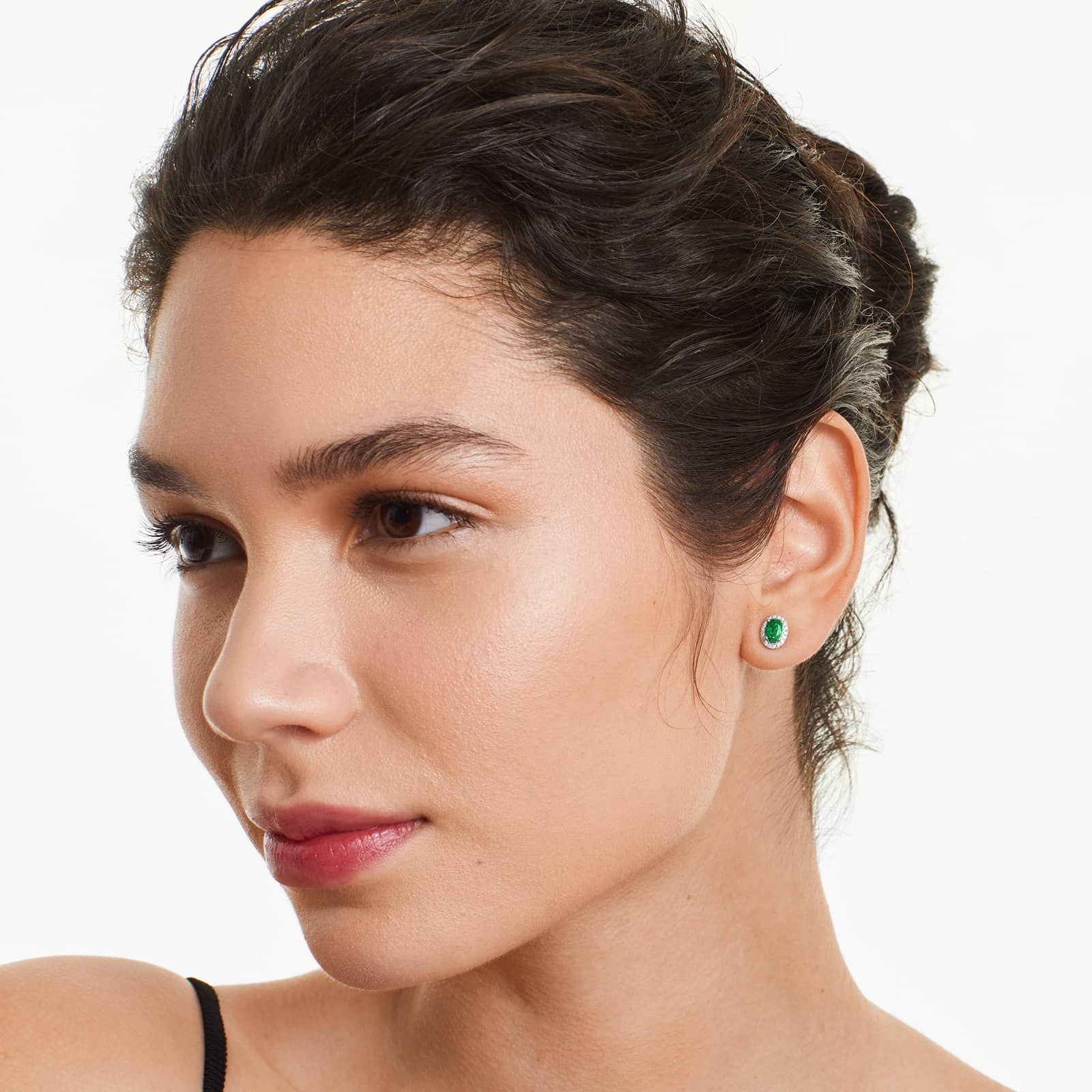 Oval Cut Emerald And Diamond Halo Earrings In 18K White Gold