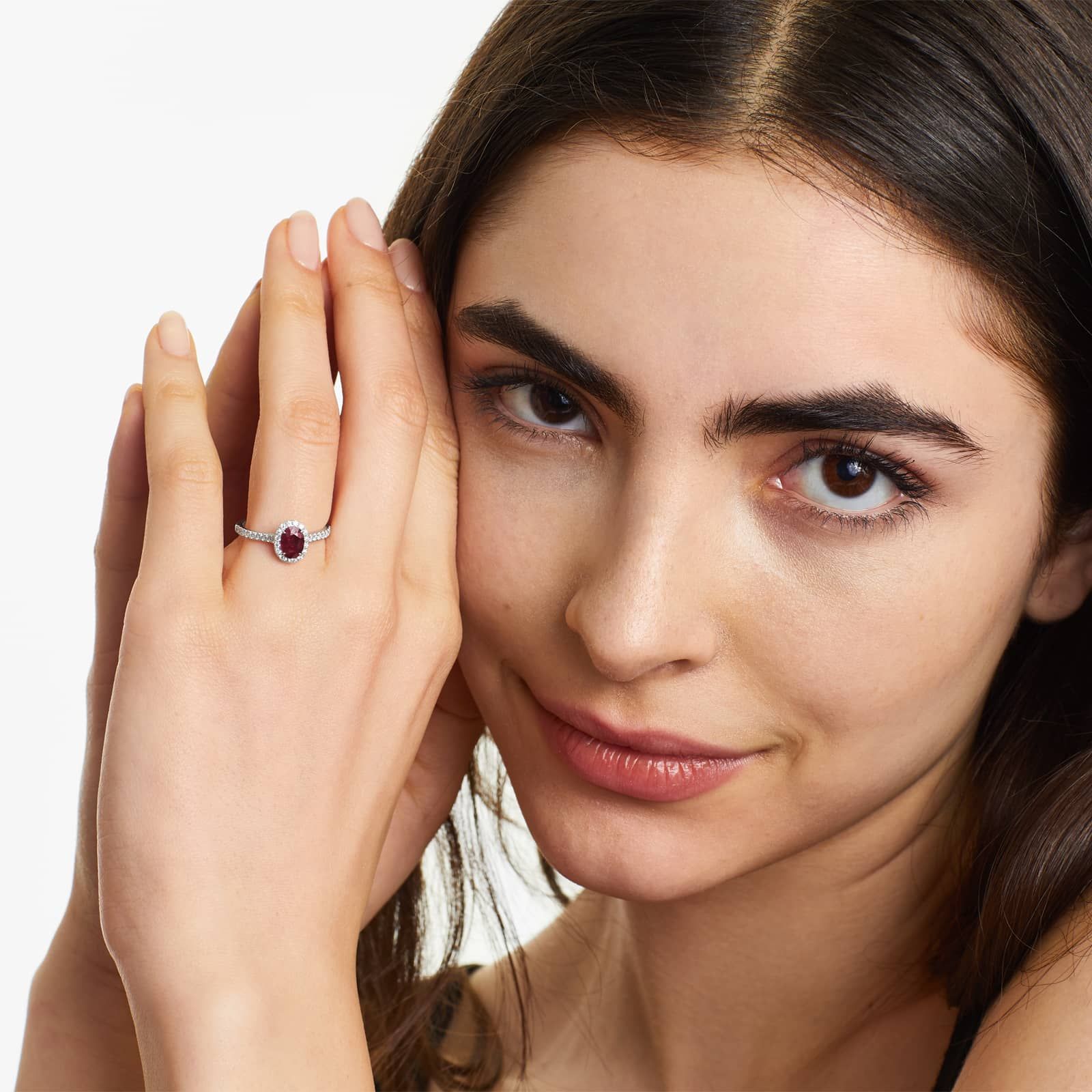 Oval Halo Ruby And Diamond Ring In 18K White Gold