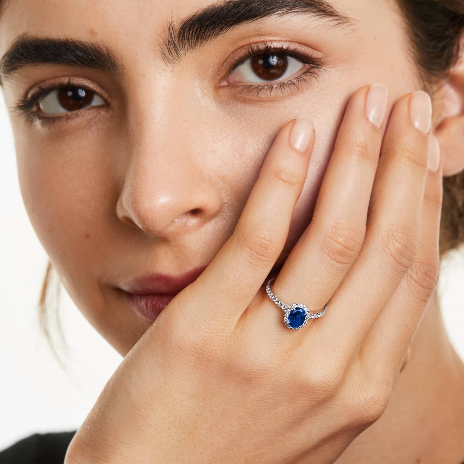 Oval Halo Sapphire And Diamond Ring In 18K White Gold