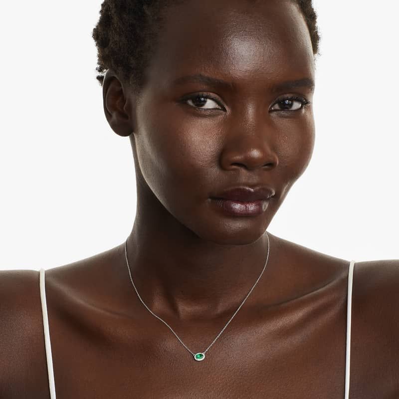 18K White Gold East West Set Oval Halo Emerald and Diamond Necklace (6.0x4.0mm)