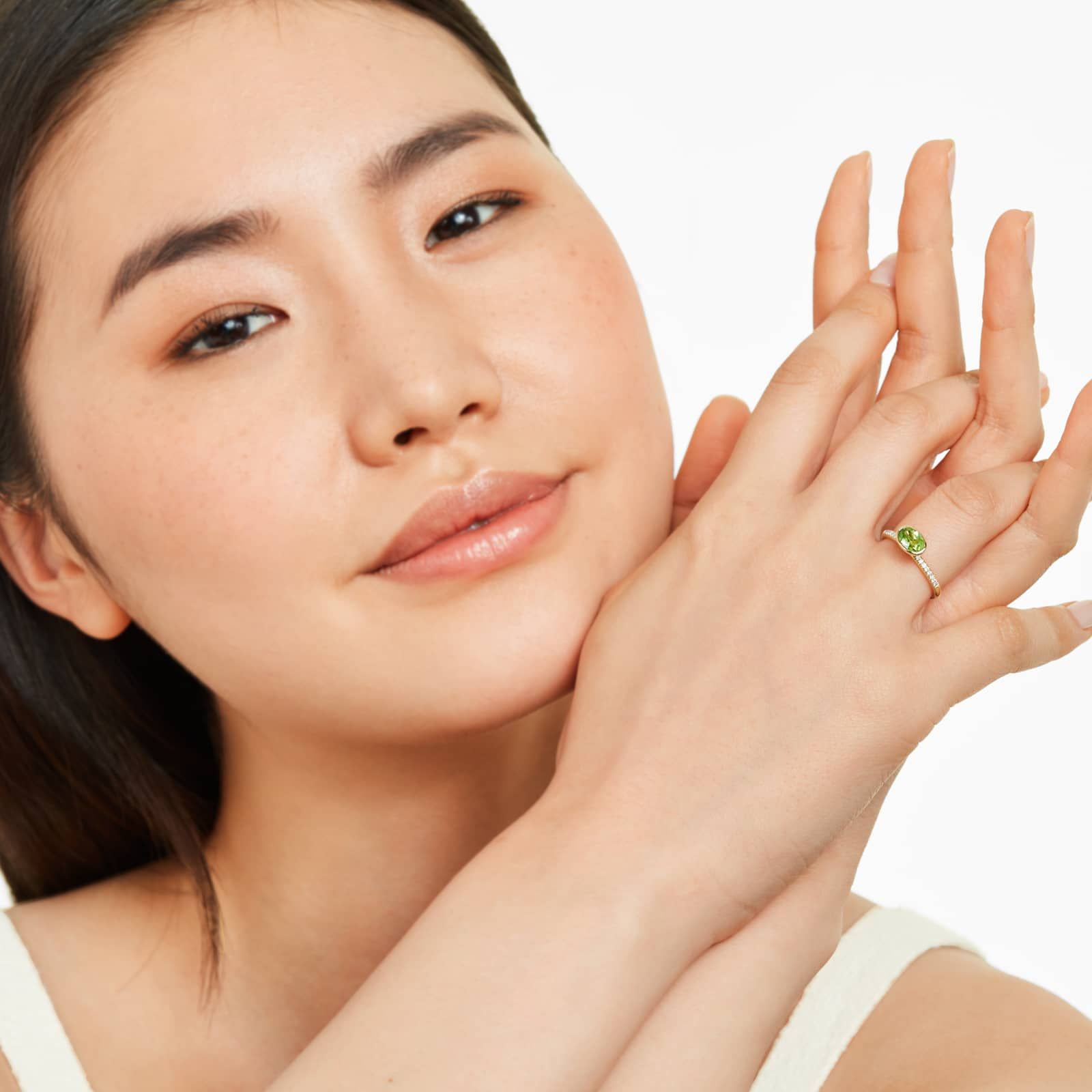 East-West Oval Peridot And Diamond Ring In 18K Yellow Gold