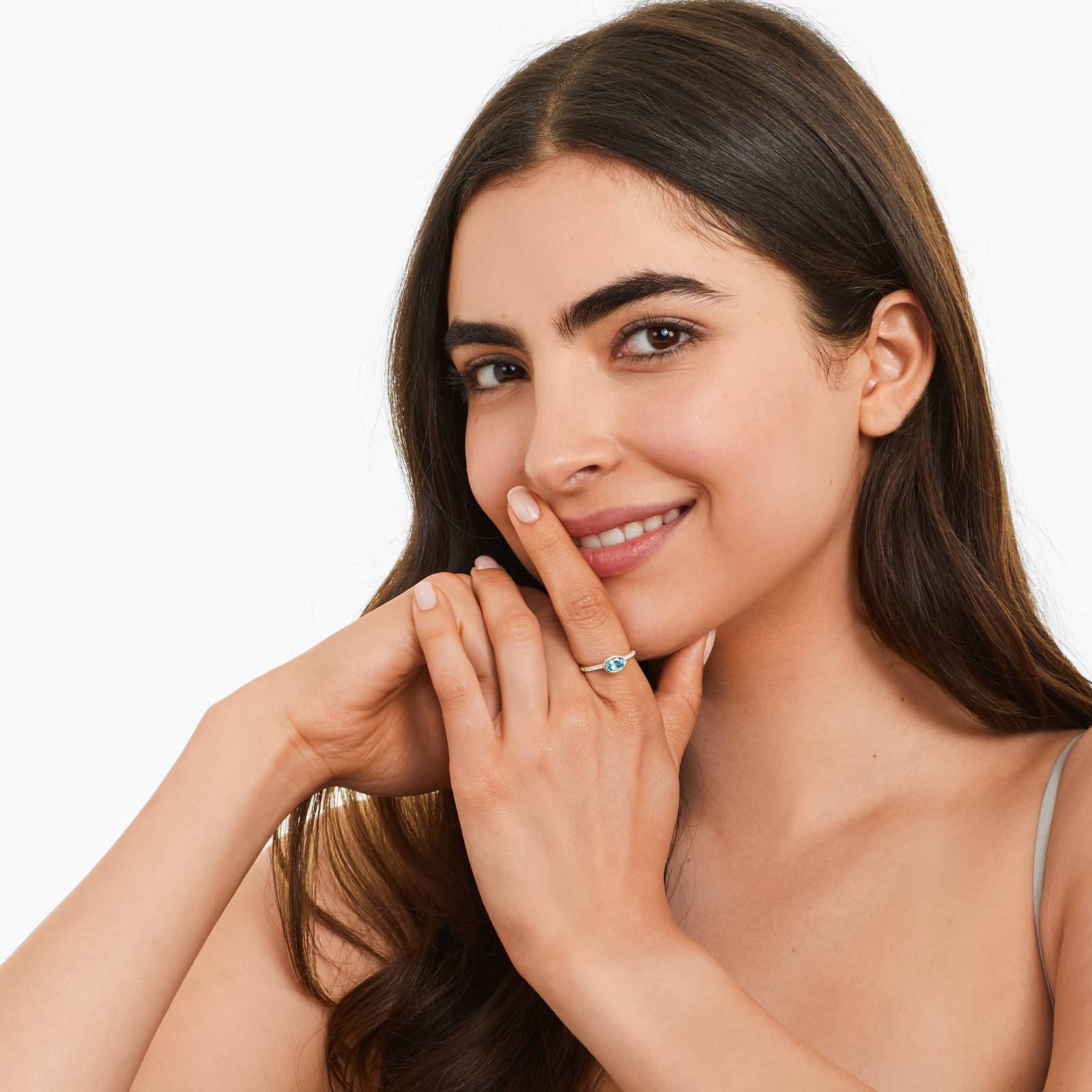 East-West Oval Blue Topaz And Diamond Ring In 18K Yellow Gold