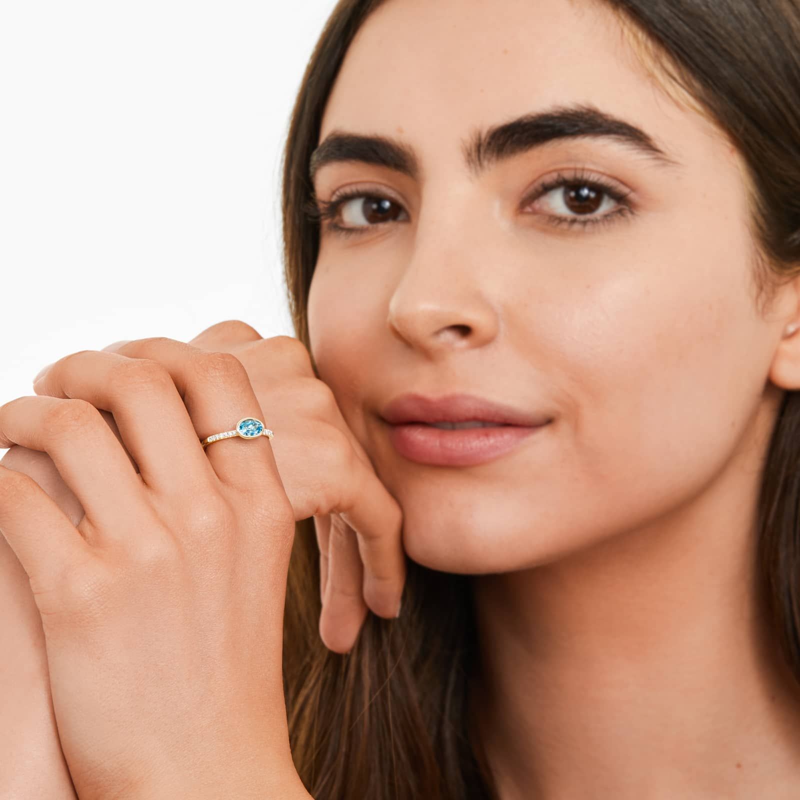East-West Oval Blue Topaz And Diamond Ring In 18K Yellow Gold