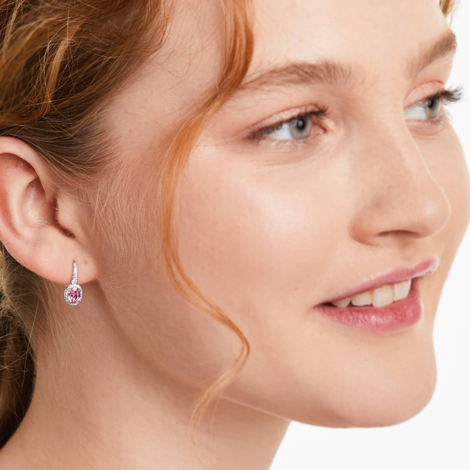 Petite Oval Cut Pink Sapphire And Diamond Halo Drop Earrings In 18K White Gold