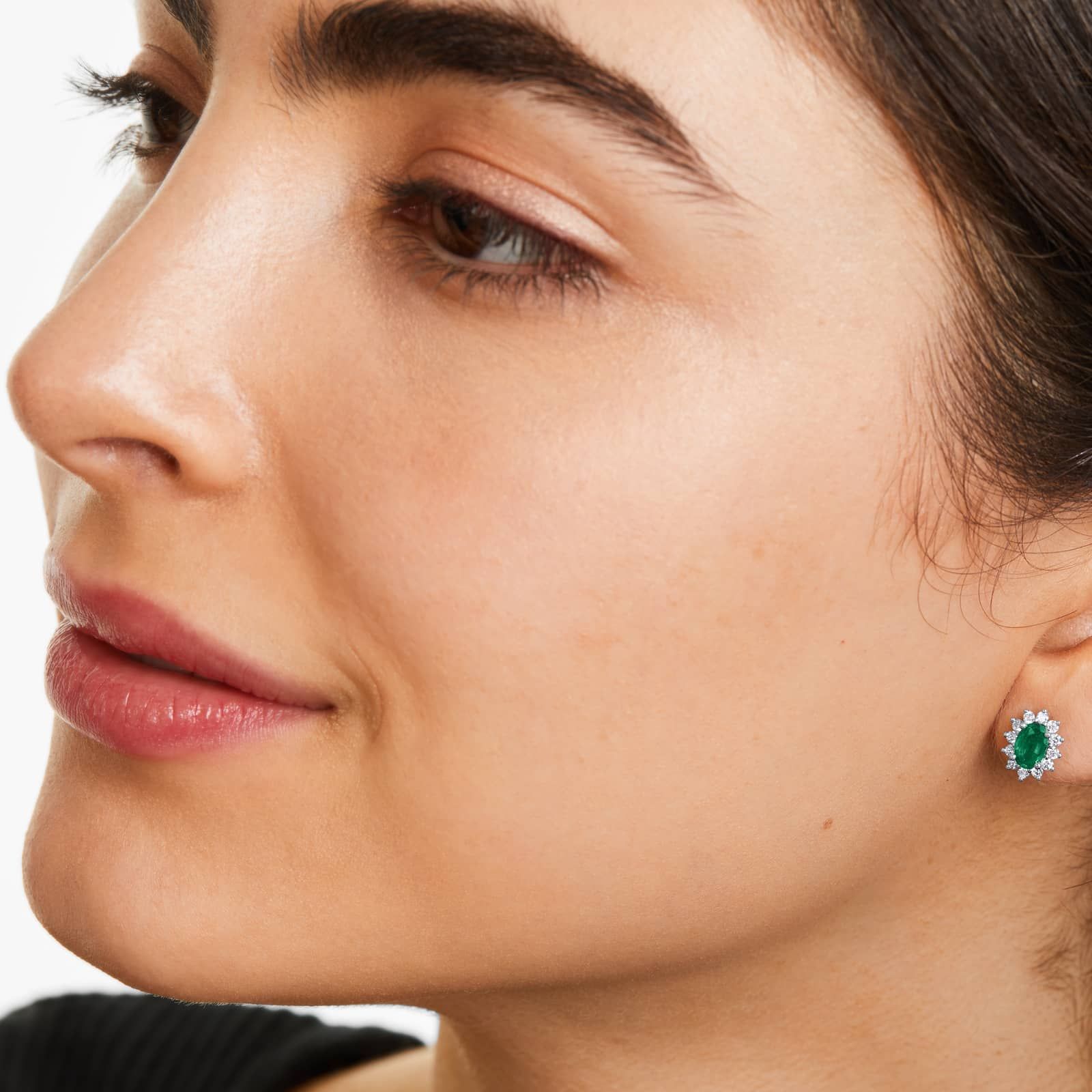 Oval Cut Emerald And Diamond Halo Earrings In 18K White Gold