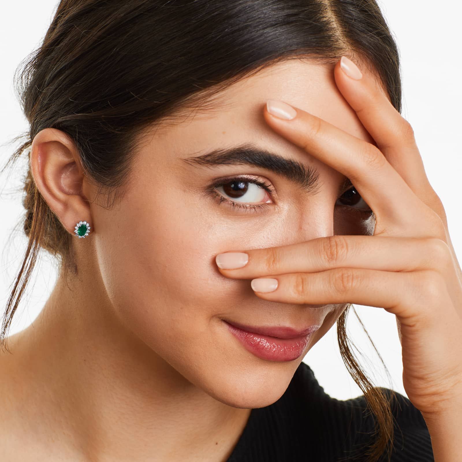 Oval Cut Emerald And Diamond Halo Earrings In 18K White Gold