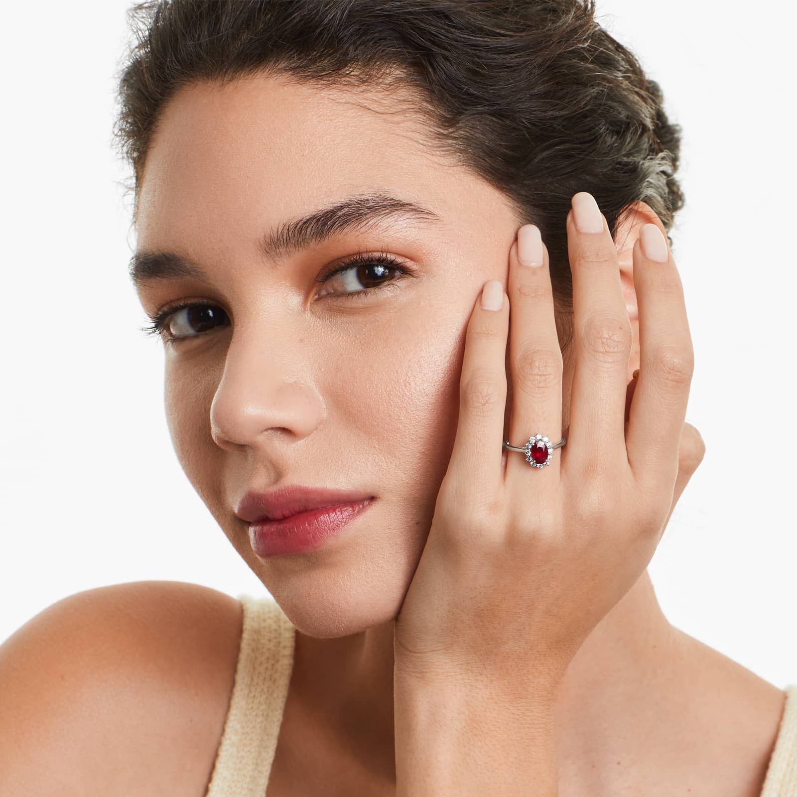 Oval Halo Ruby And Diamond Ring In 18K White Gold