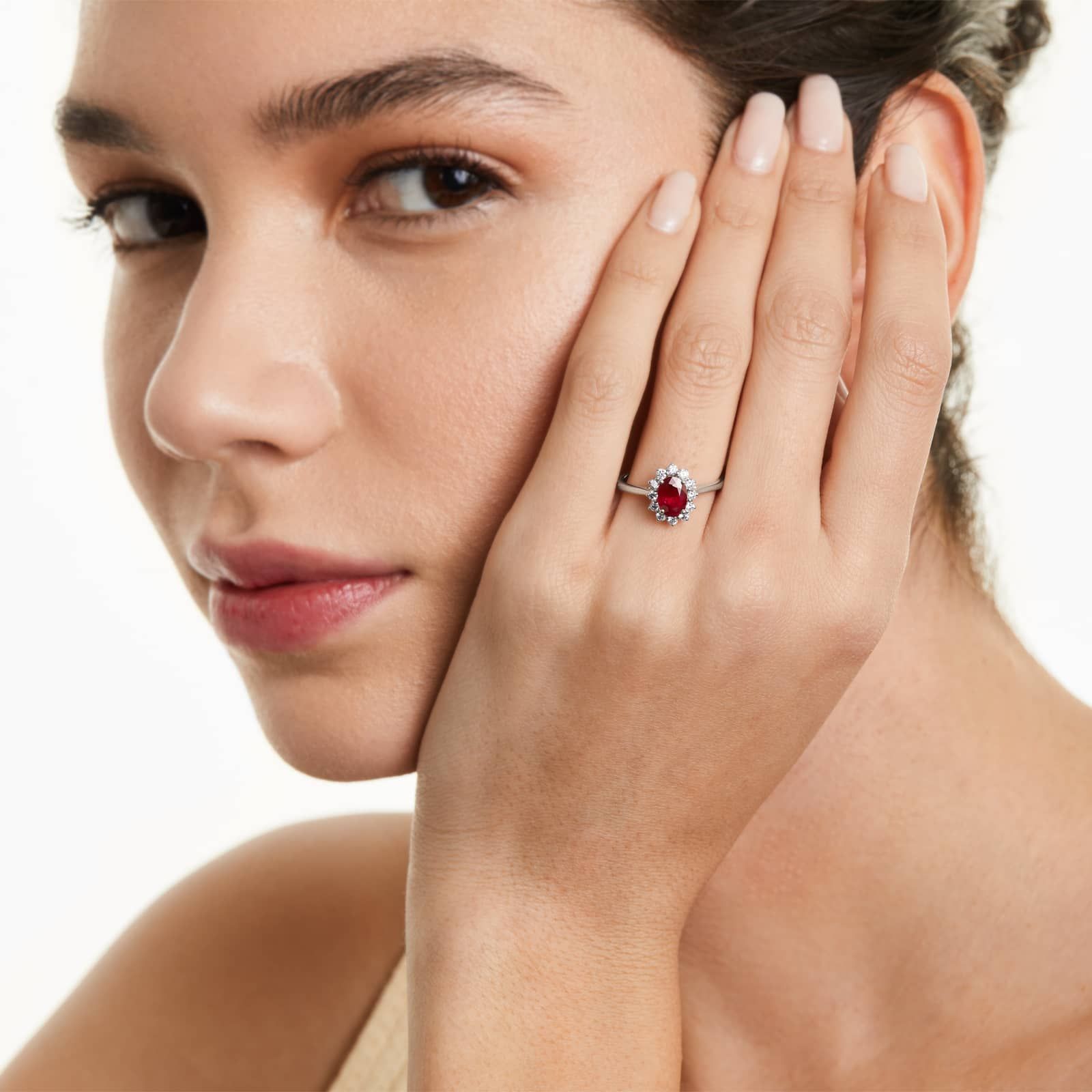 Oval Halo Ruby And Diamond Ring In 18K White Gold