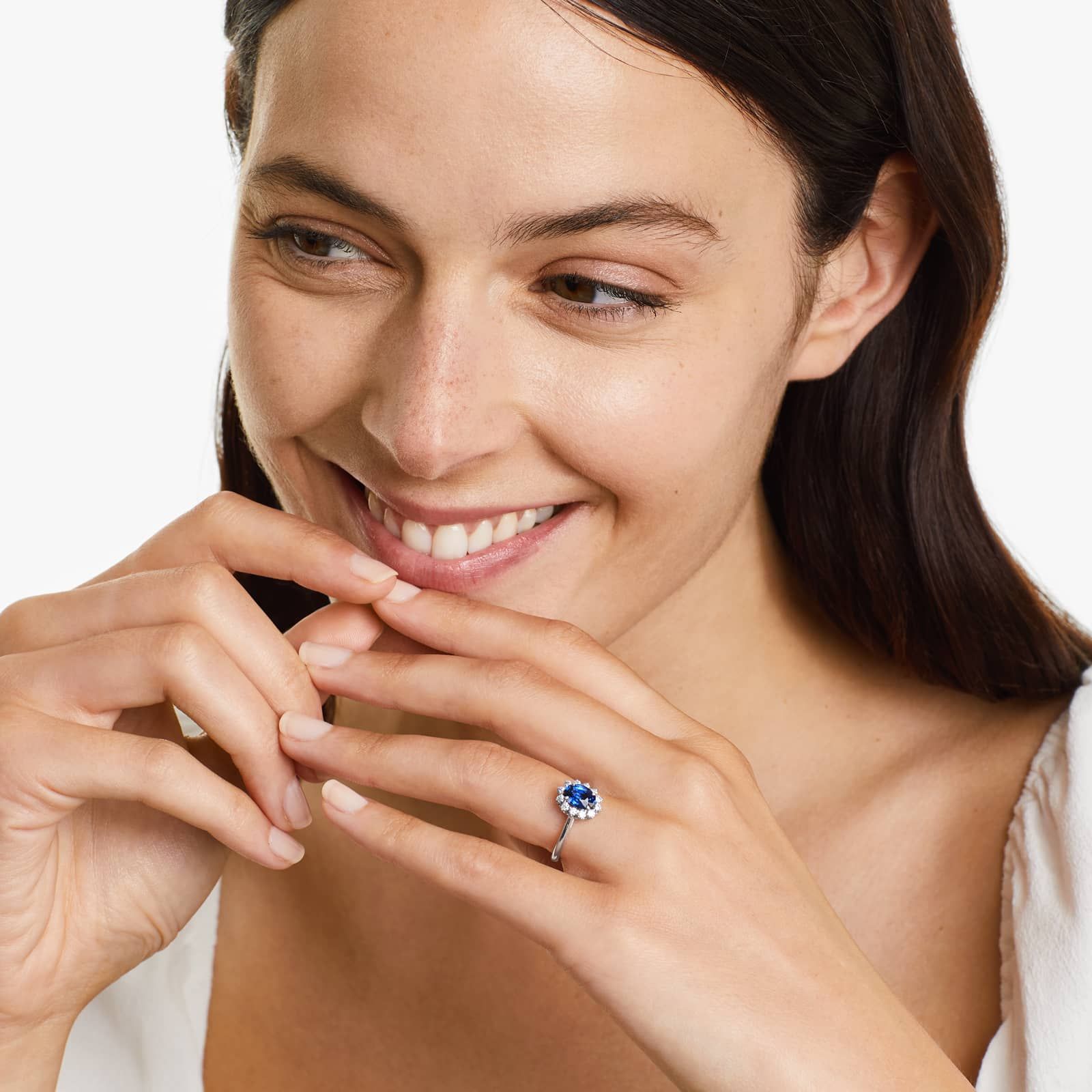 Oval Halo Sapphire And Diamond Ring In 18K White Gold