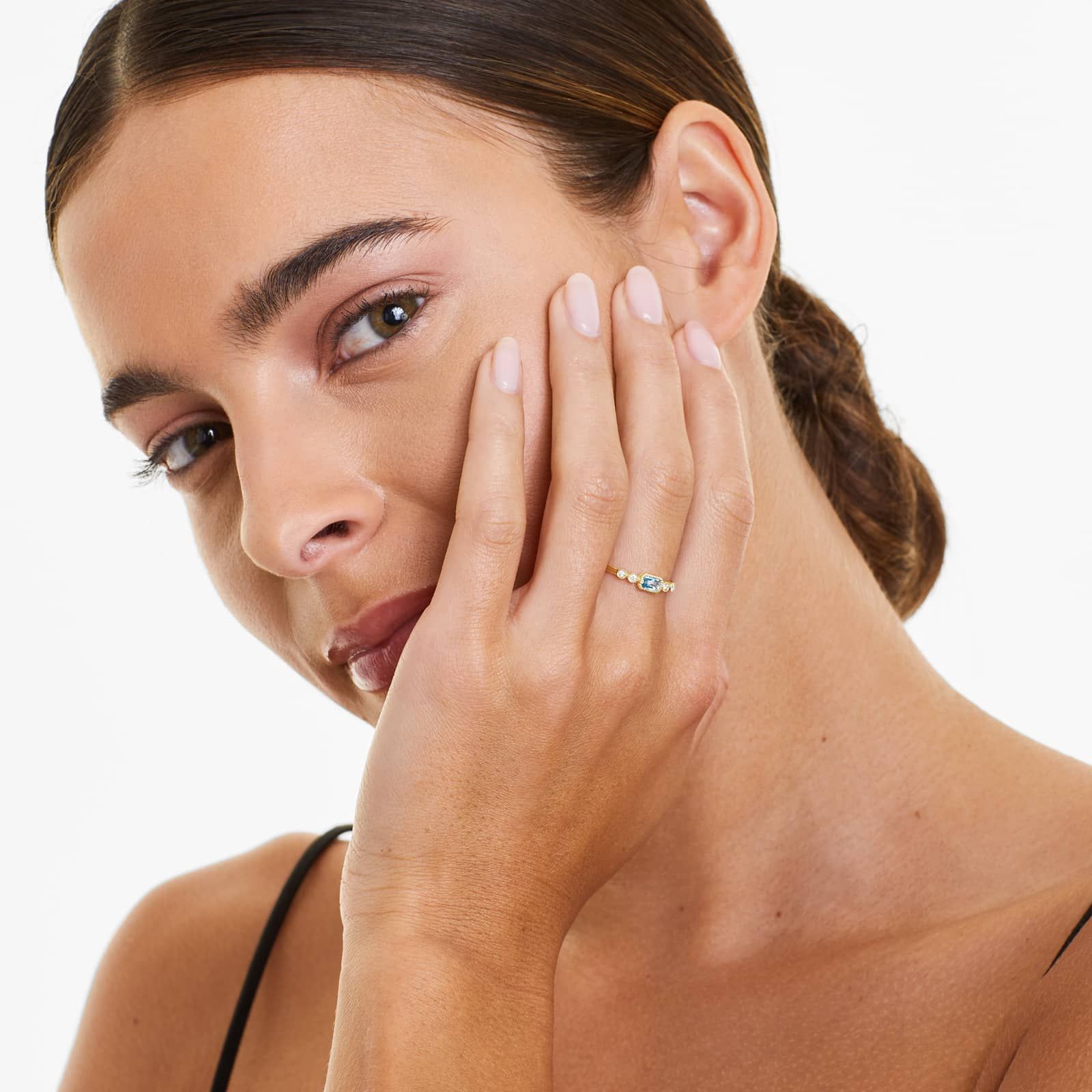 Dainty Blue Topaz Bezel Diamond Ring In 14K Yellow Gold by Brevani