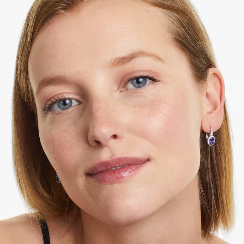 Oval Cut Tanzanite And Diamond Halo Drop Earrings In 14K White Gold