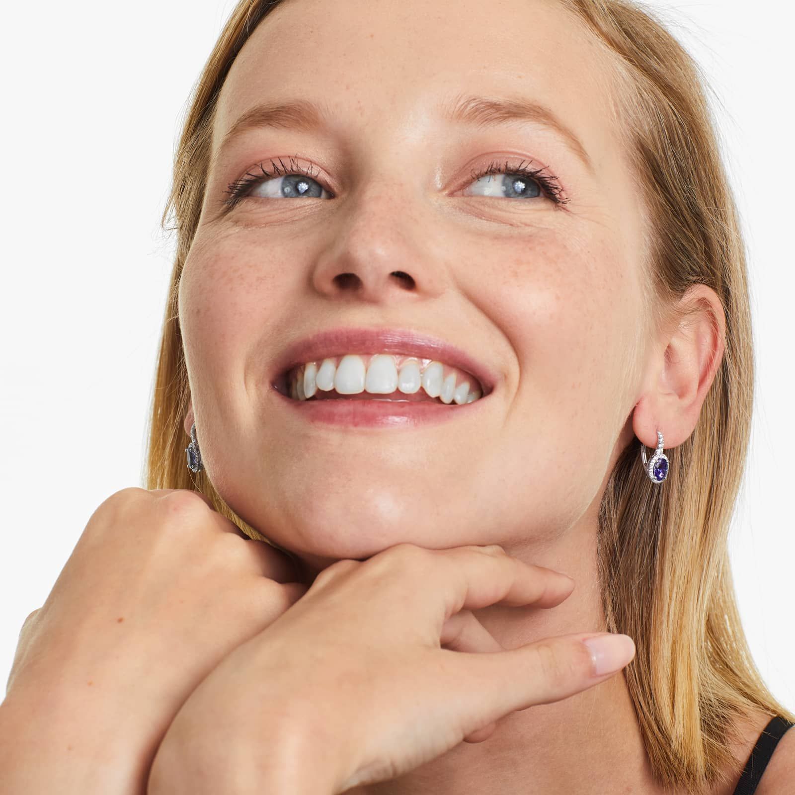 Oval Cut Tanzanite And Diamond Halo Drop Earrings In 14K White Gold