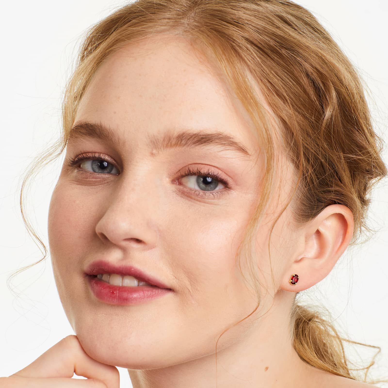 Oval Cut Garnet Birthstone Earrings In 14K Yellow Gold