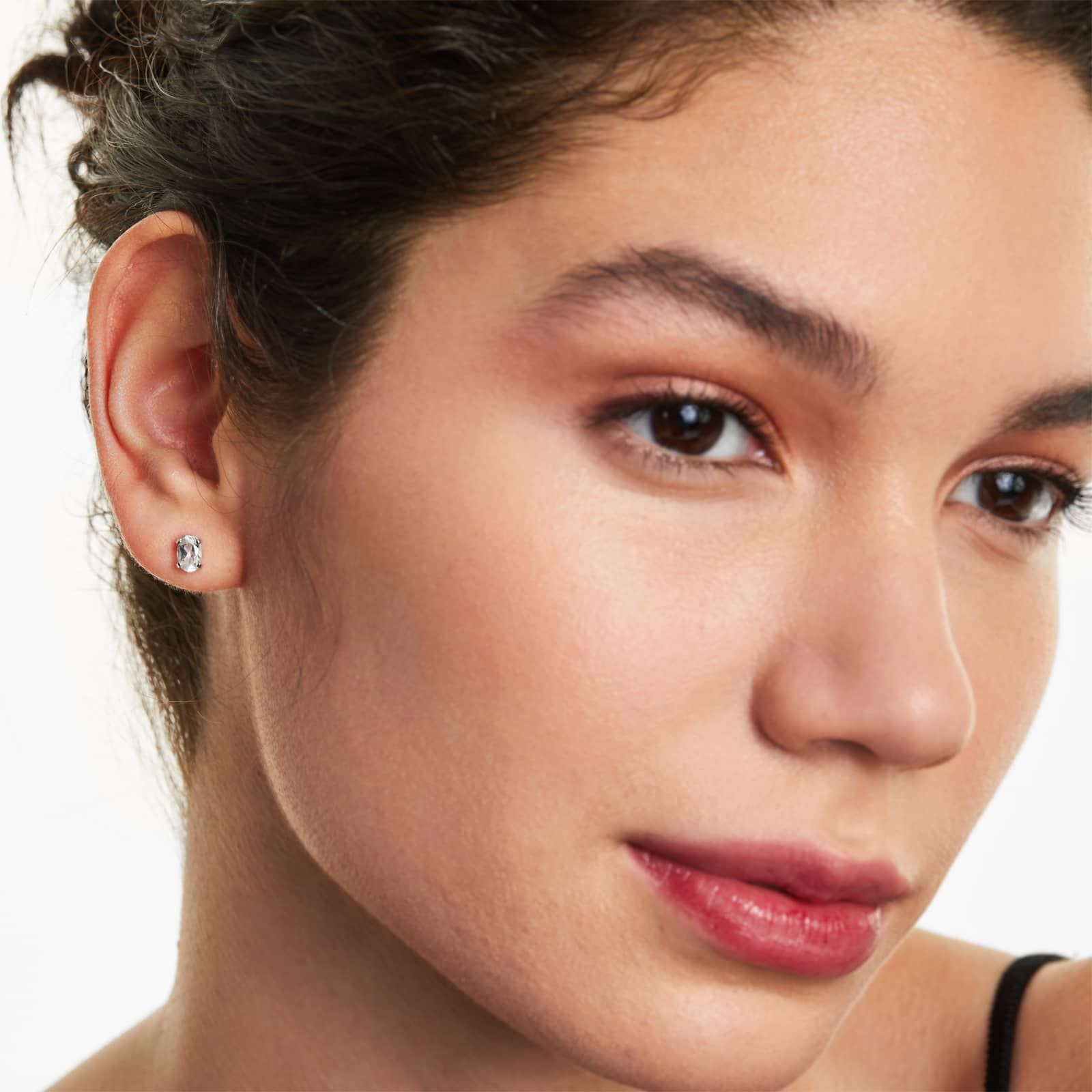 Oval Cut White Topaz Birthstone Earrings In 14K White Gold