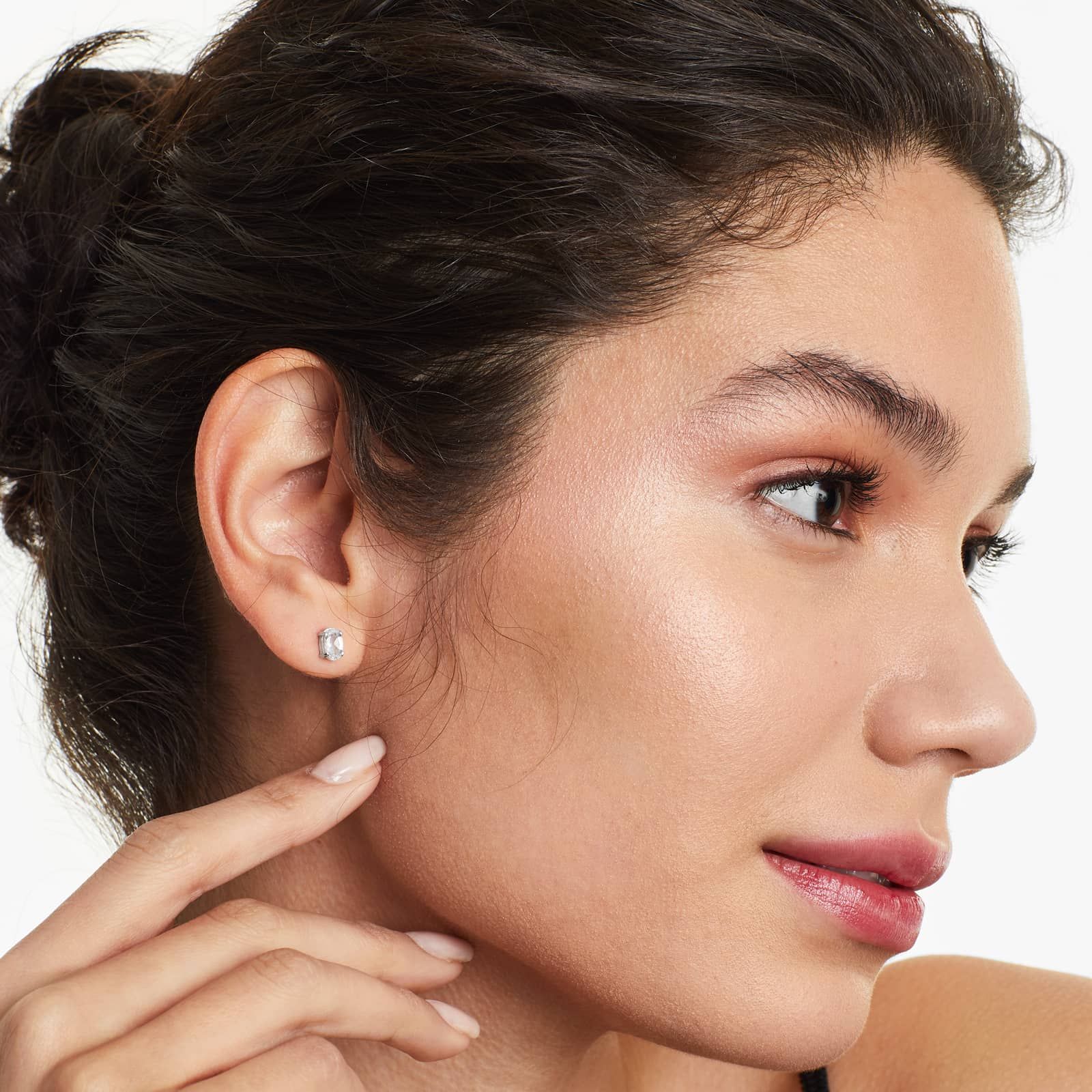 Oval Cut White Topaz Birthstone Earrings In 14K White Gold