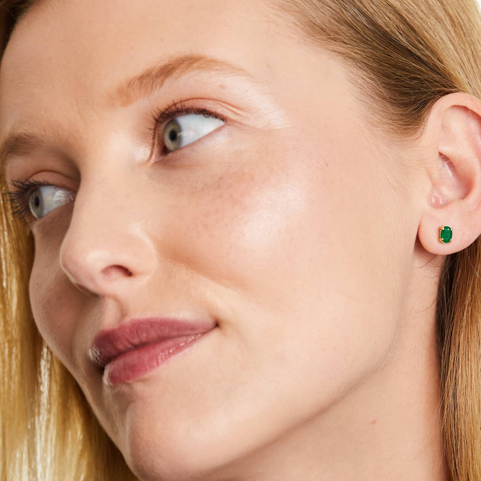 Oval Cut Emerald Birthstone Earrings In 14K Yellow Gold