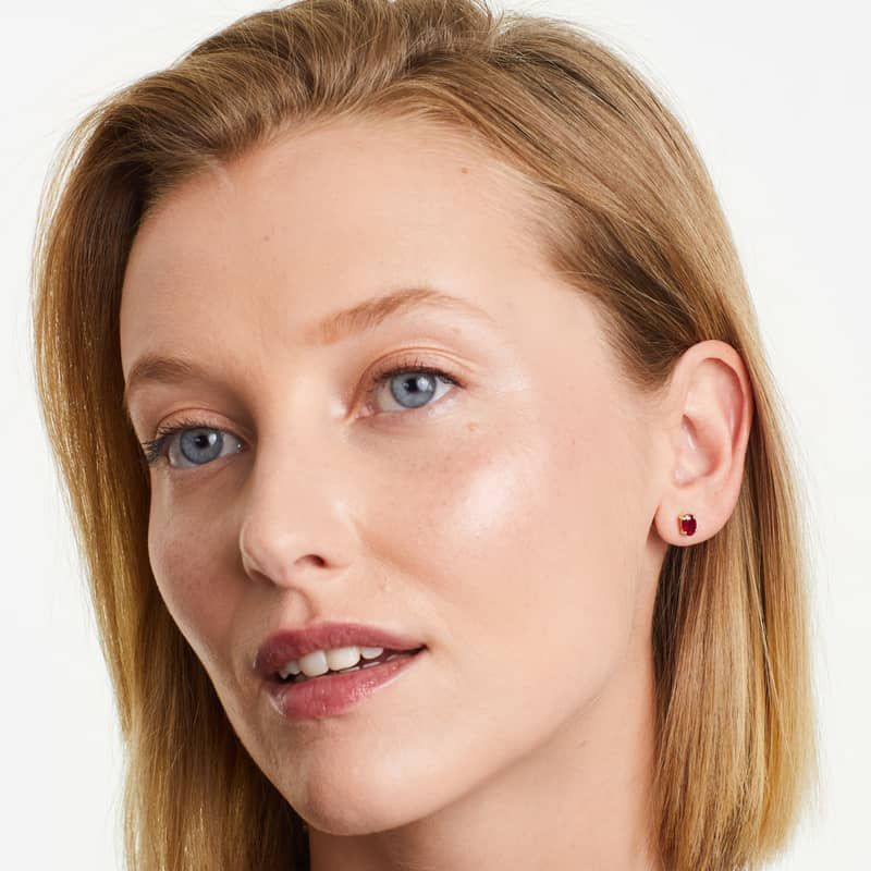 Oval Cut Ruby Birthstone Earrings In 14K Yellow Gold