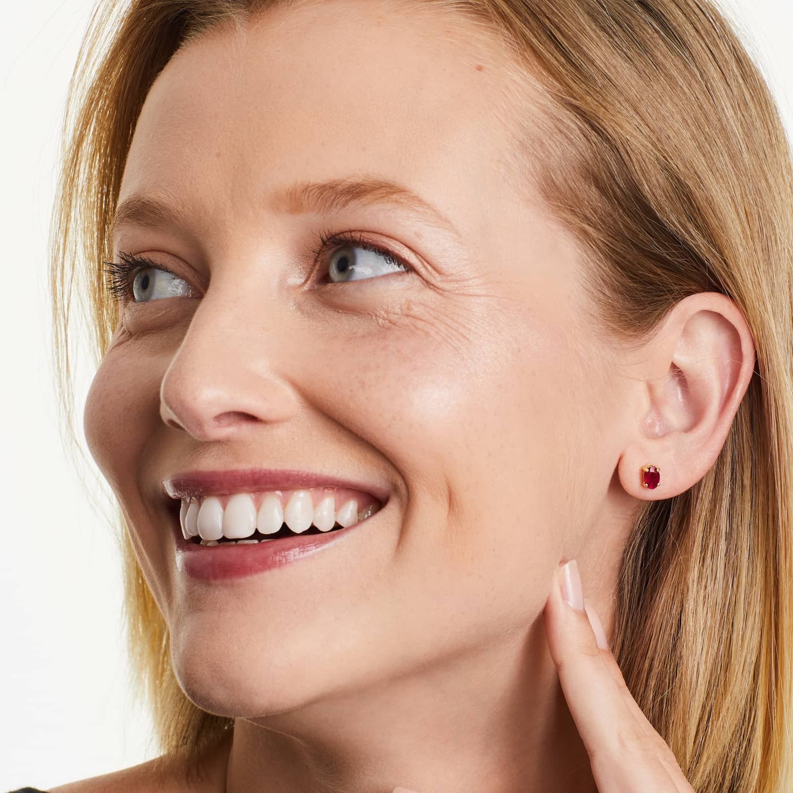 Oval Cut Ruby Birthstone Earrings In 14K Yellow Gold