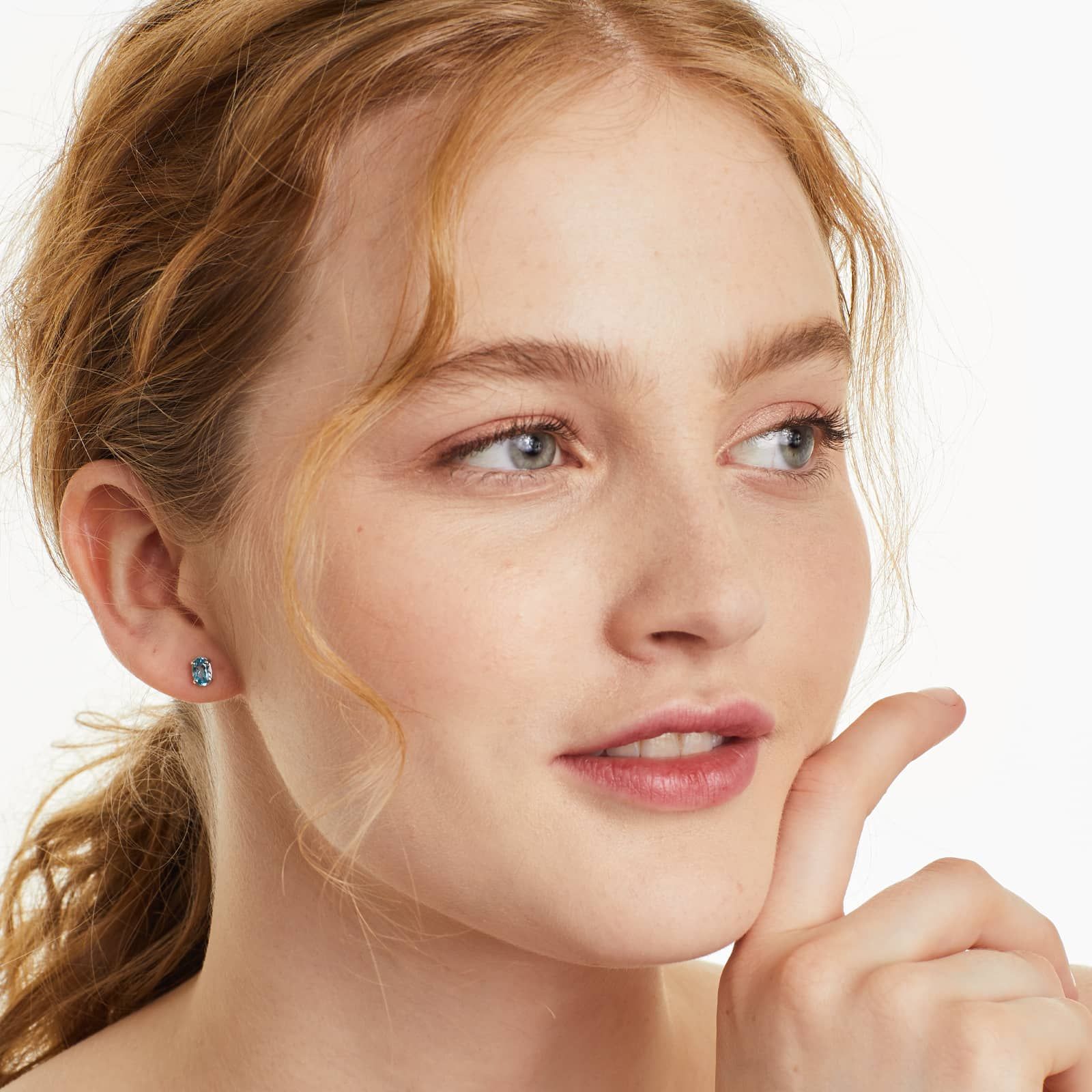 Oval Cut Blue Topaz Birthstone Earrings In 14K White Gold