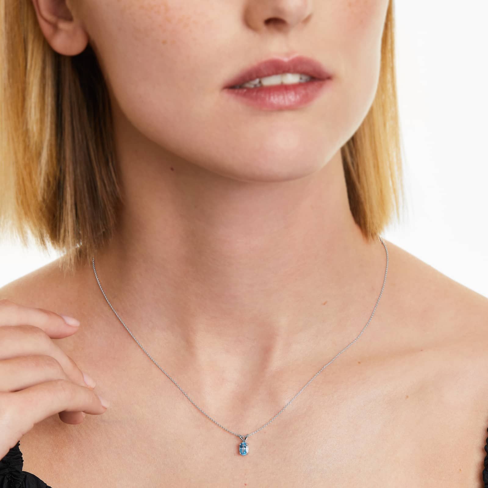 14K White Gold Oval Blue Topaz Birthstone Necklace