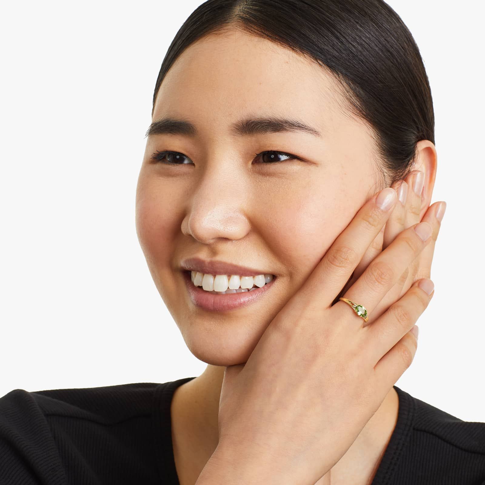 Oval Peridot And Diamond Accent Birthstone Ring In 14K Yellow Gold