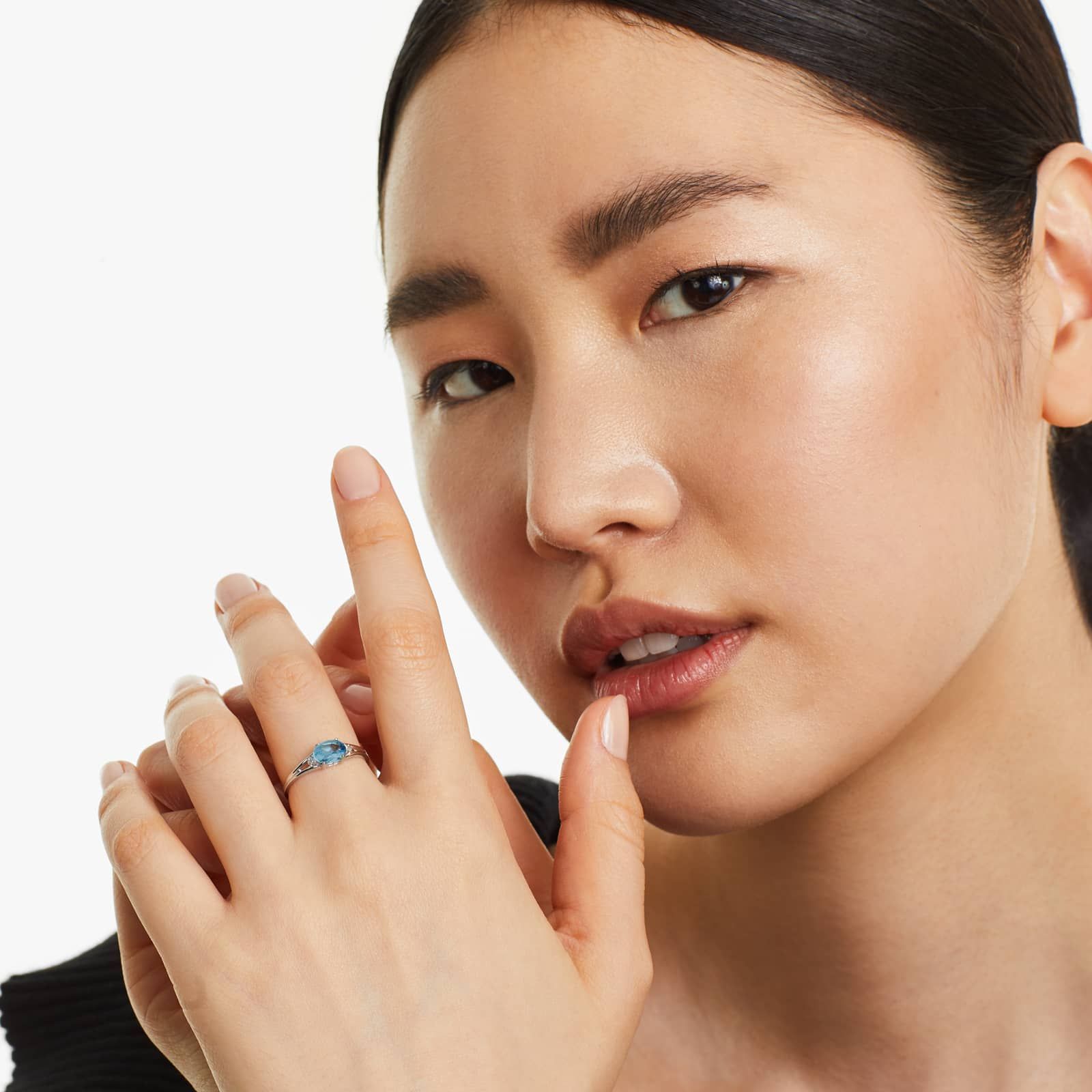 Oval Blue Topaz And Diamond Accent Birthstone Ring In 14K White Gold