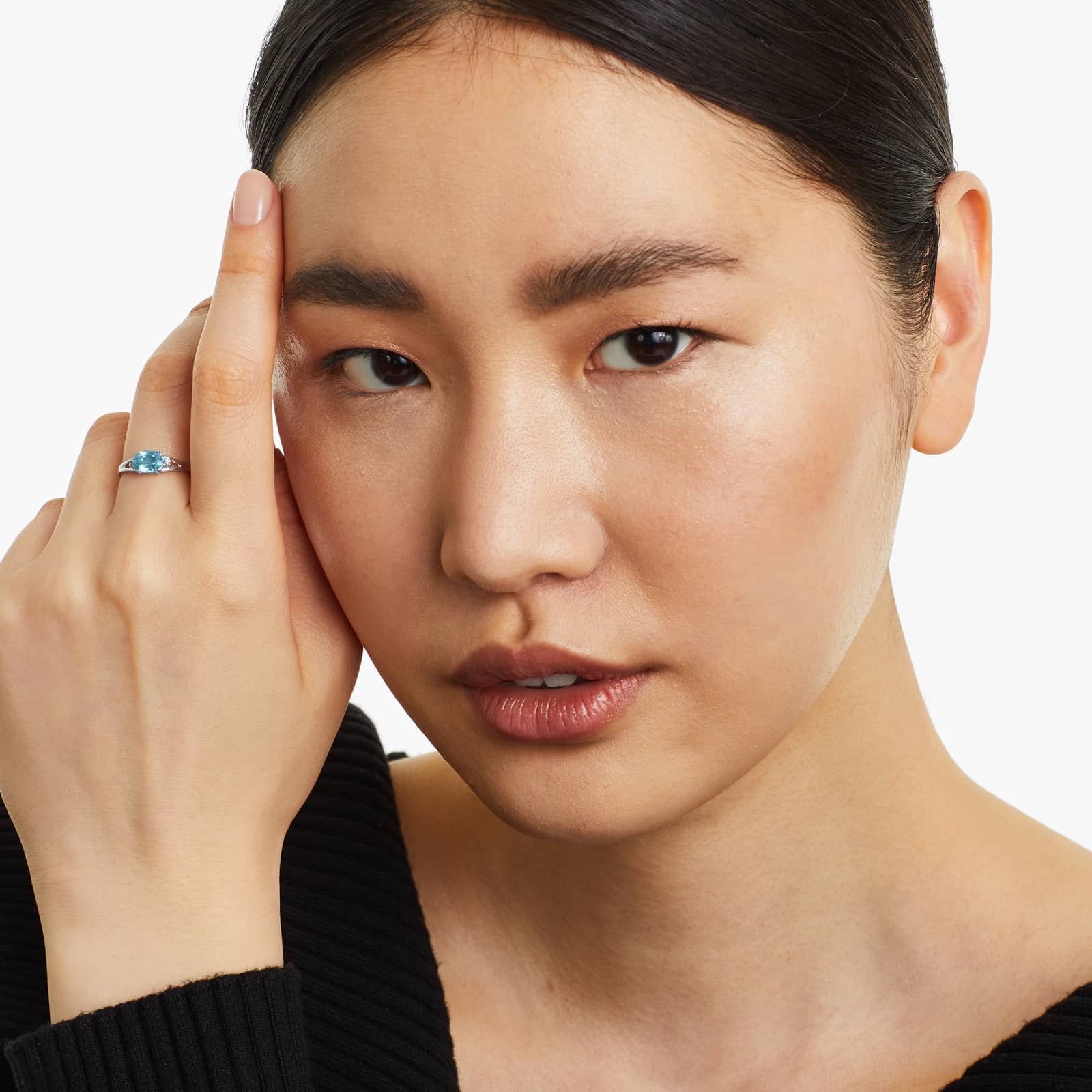 Oval Blue Topaz And Diamond Accent Birthstone Ring In 14K White Gold