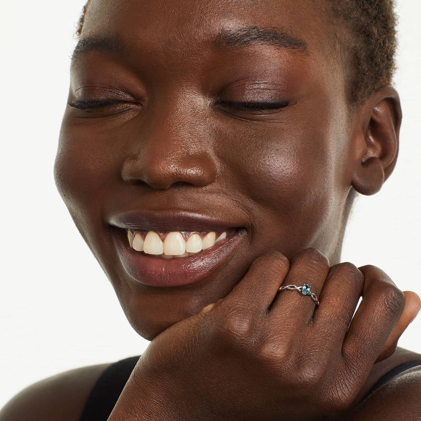 Infinity Blue Topaz Birthstone Ring In 14K White Gold