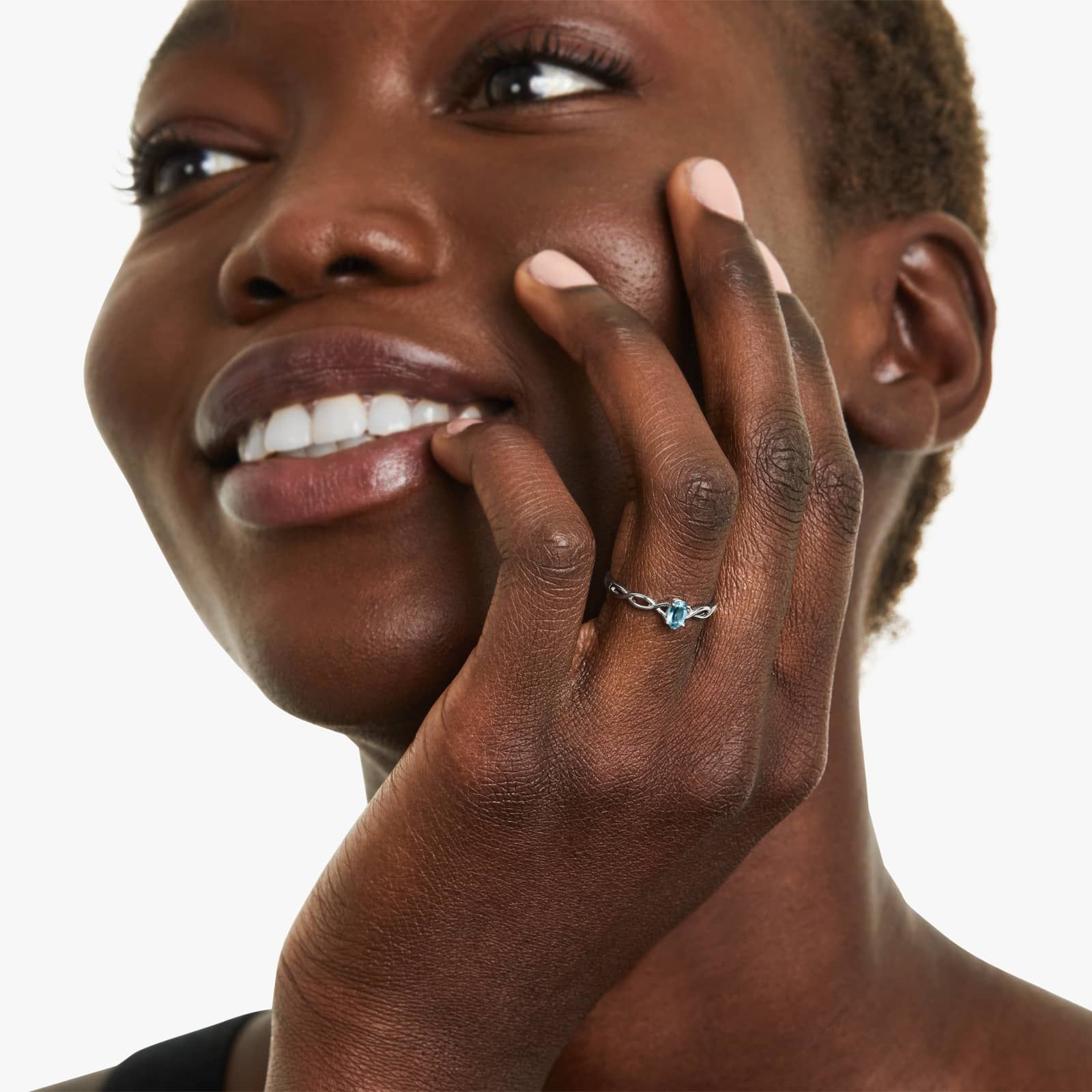 Infinity Blue Topaz Birthstone Ring In 14K White Gold