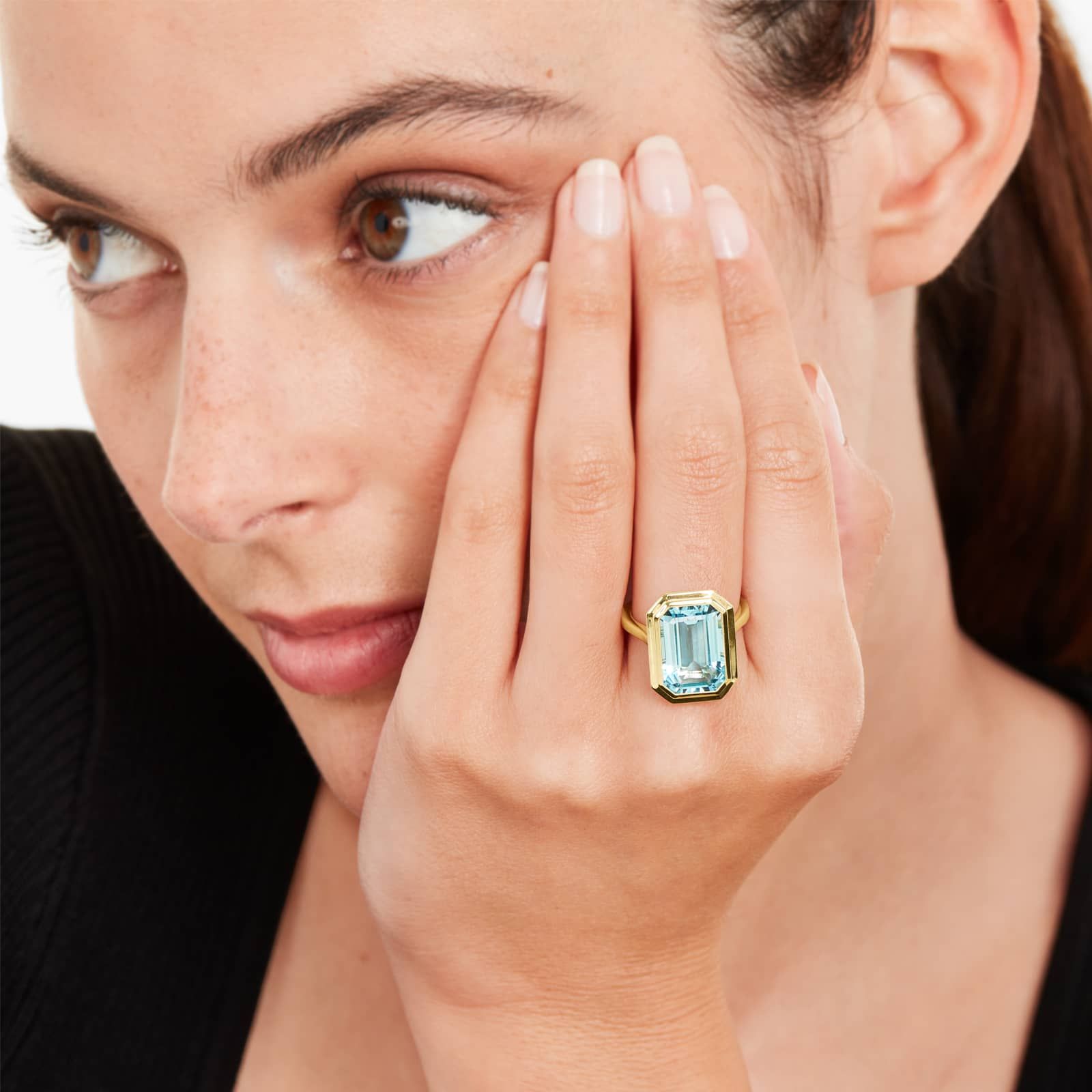 Emerald Cut Bezel Sky Blue Topaz Cocktail Ring In 18K Yellow Gold