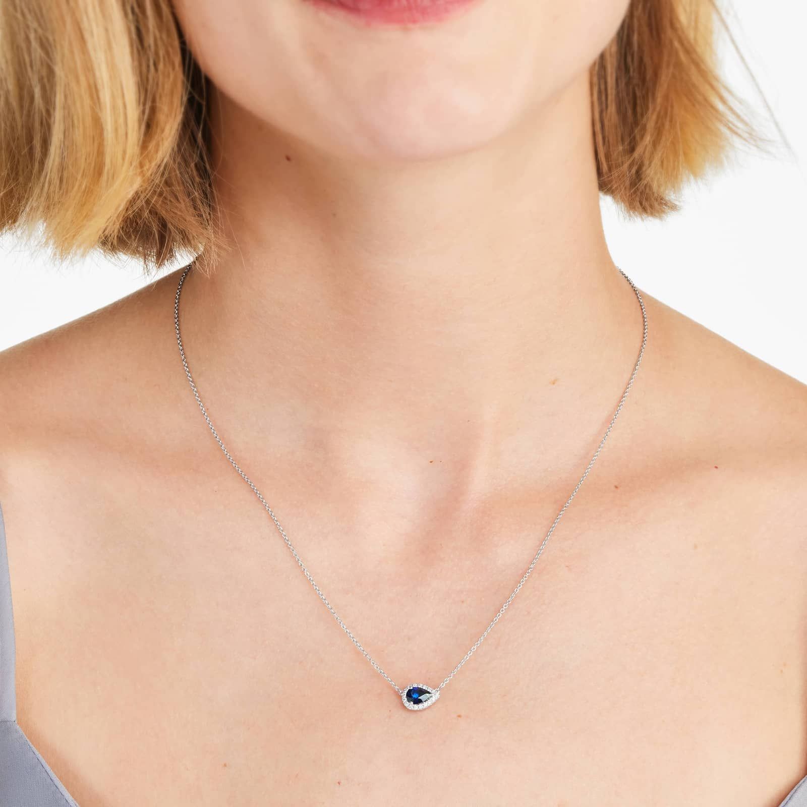 18K White Gold Sideways Pear Sapphire and Diamond Halo Necklace