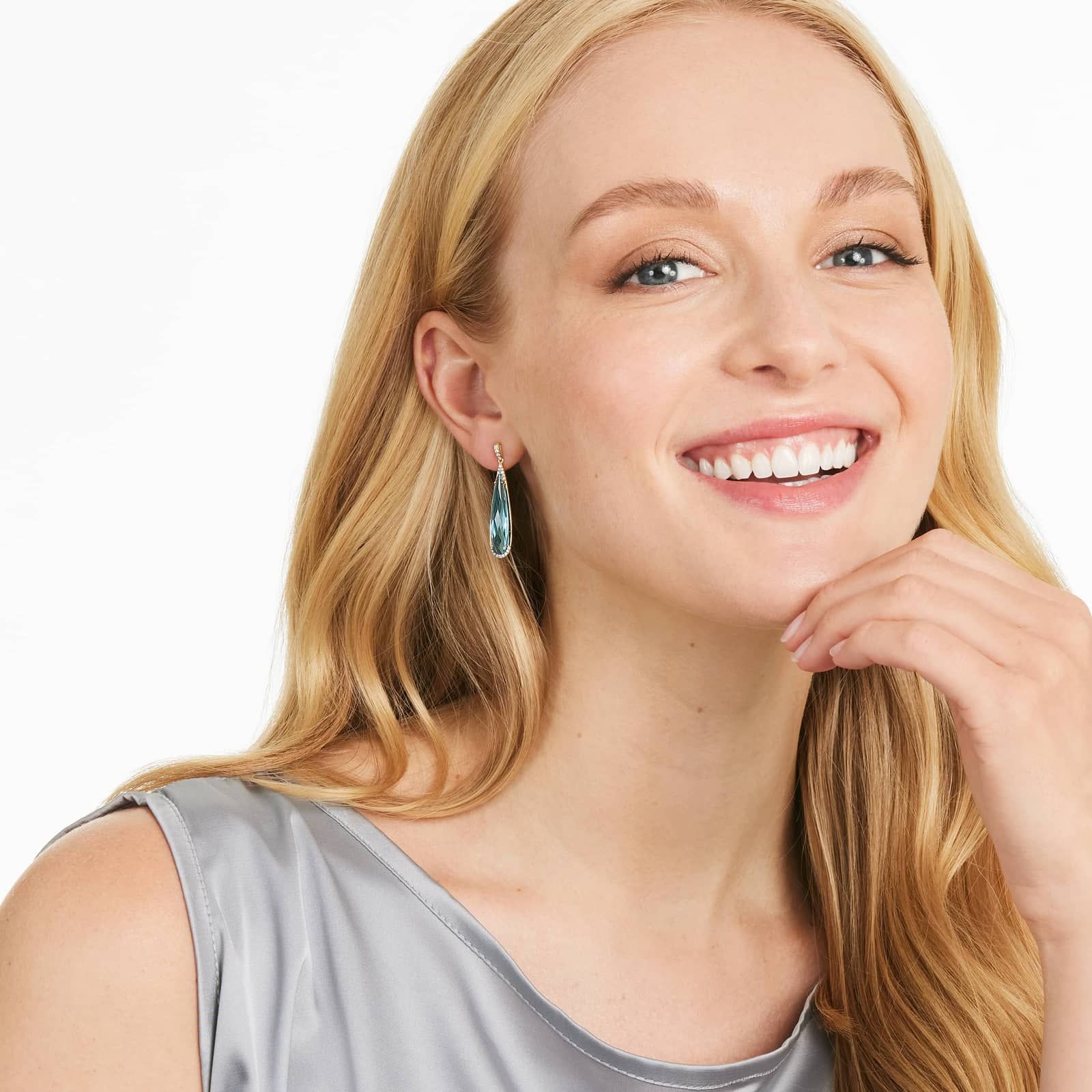 Elongated Pear Shape Blue Topaz Earrings In 14K Yellow Gold