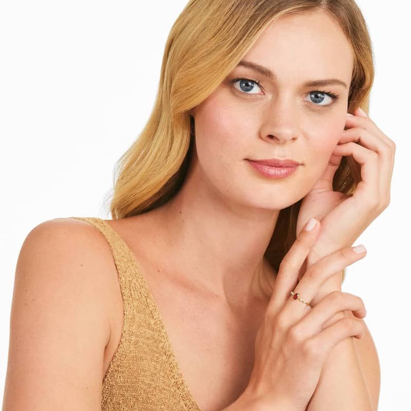 Oval Garnet And Diamond Birthstone Ring In 14K Yellow Gold