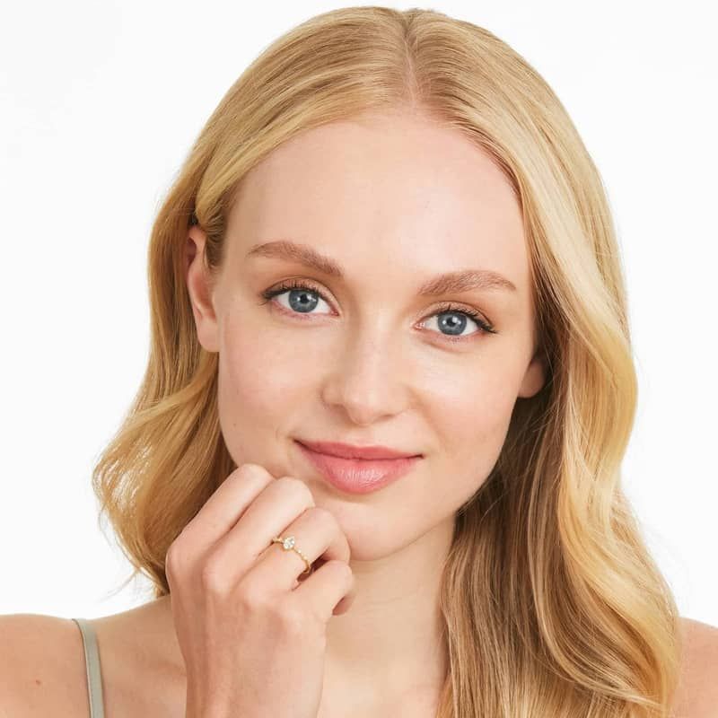 Oval Aquamarine And Diamond Birthstone Ring In 14K Yellow Gold